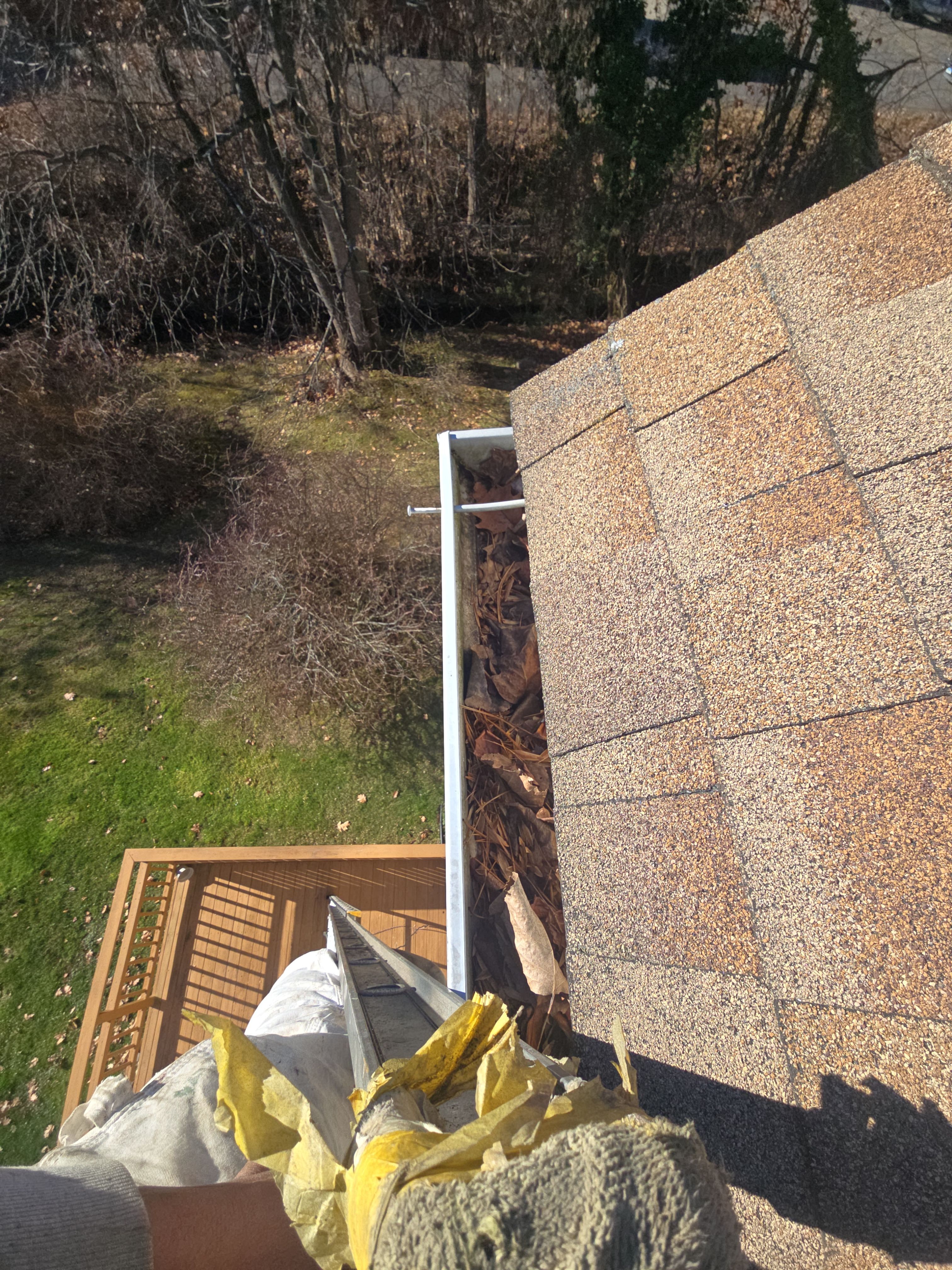 Commercial gutter cleaning Hartford, CT before photo with filled gutters