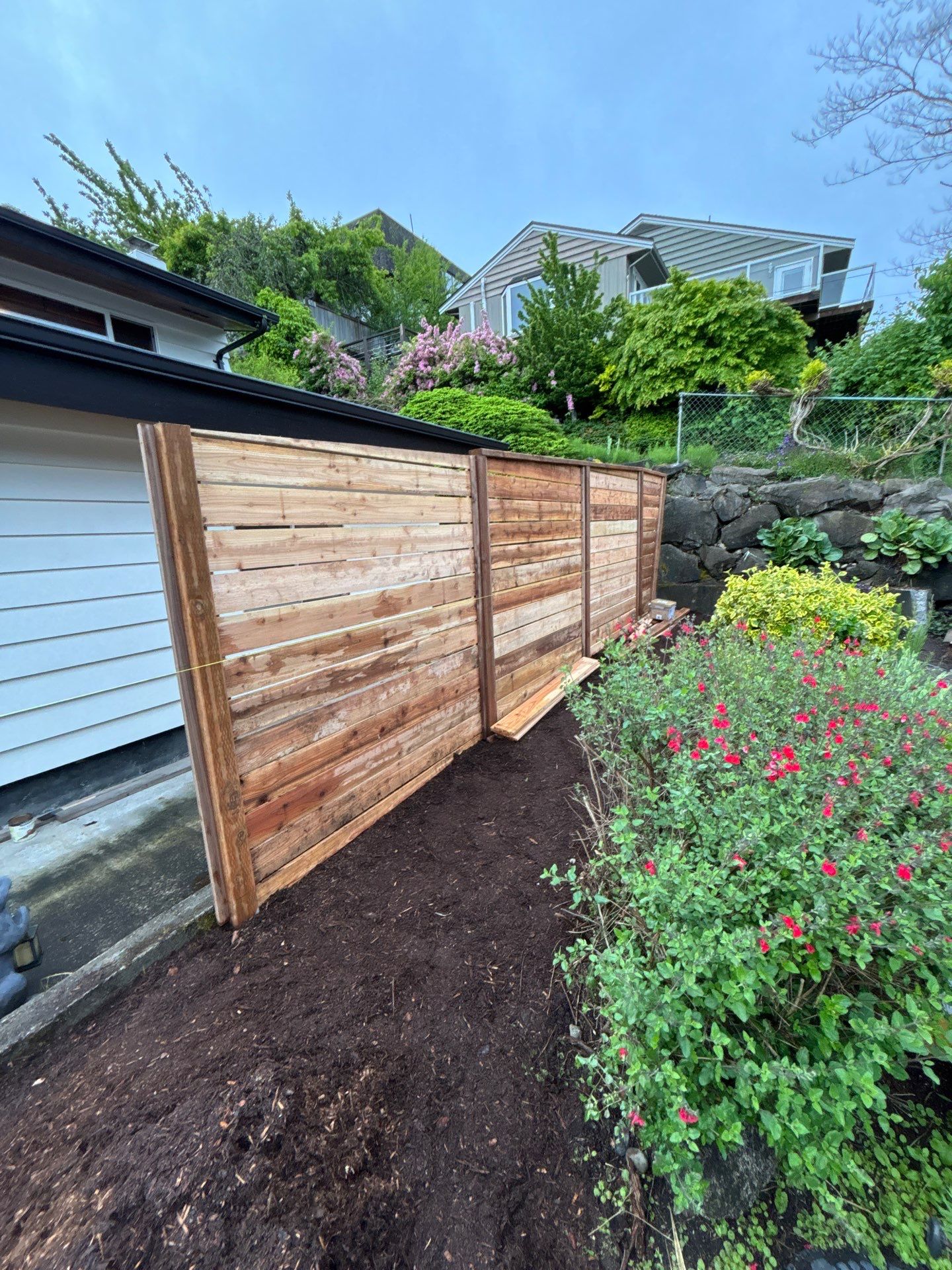Retaining Wall & Fence Installation  by Jireh Asphalt & Concrete Inc 