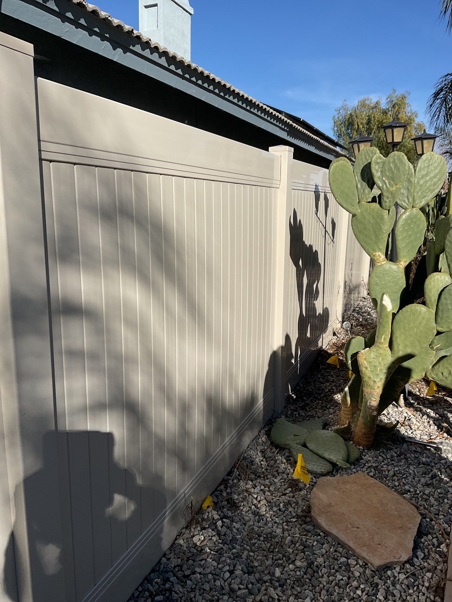 Beautiful vinyl fence installation by Fence Guys Inc.