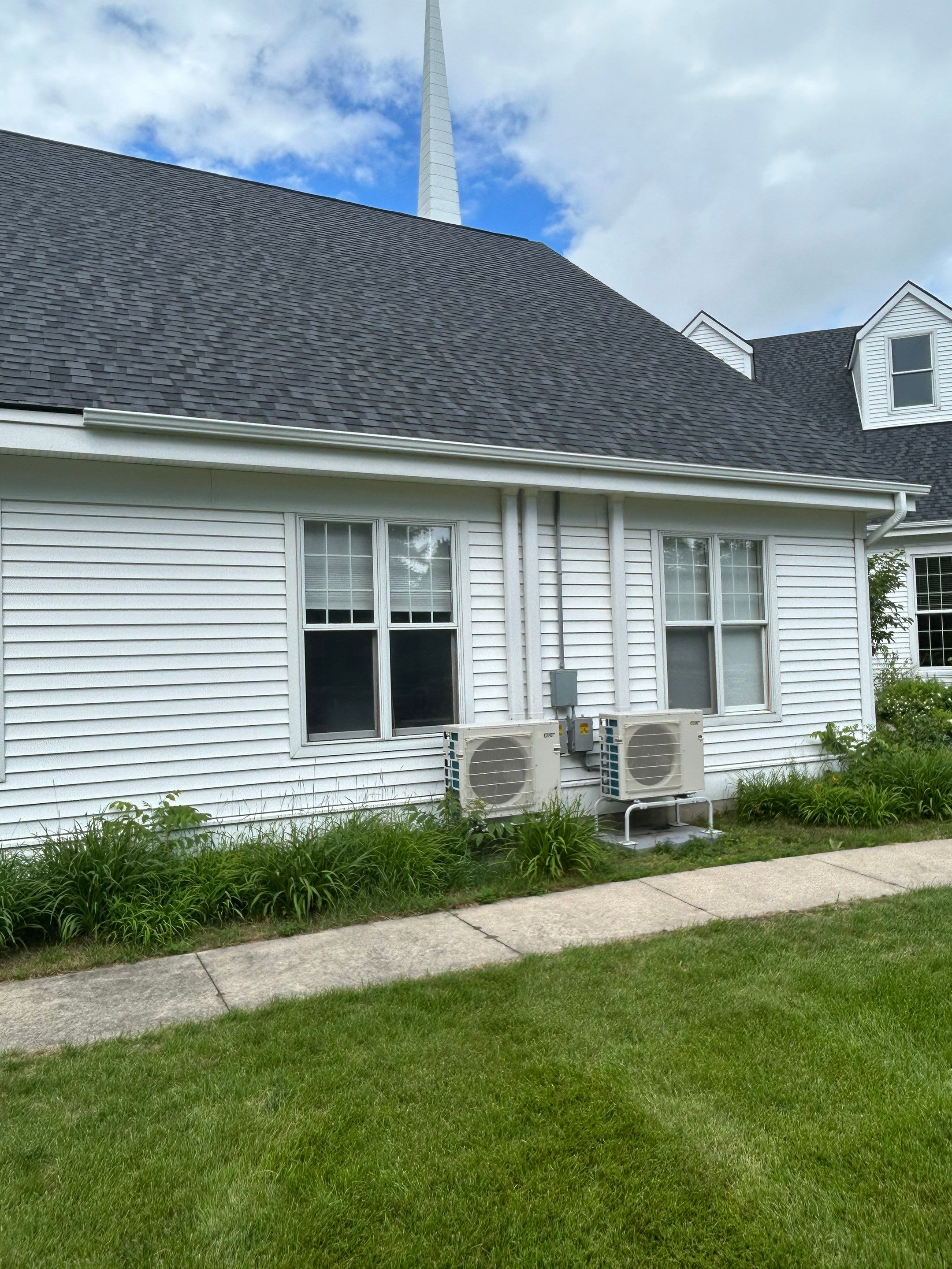 Gutter and Gutter Screen Installation for Harbor Springs Church by Rainbow Seamless Systems