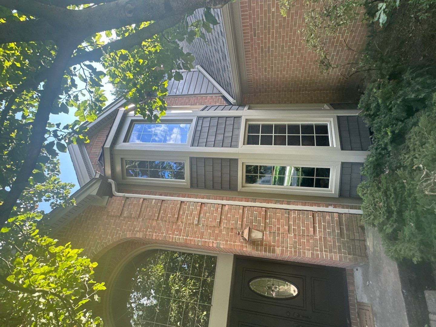 Roof Replacement using Owens Corning Peppercorn and Siding Replacement using Ascend Charcoal Smoke by 180 Contractors