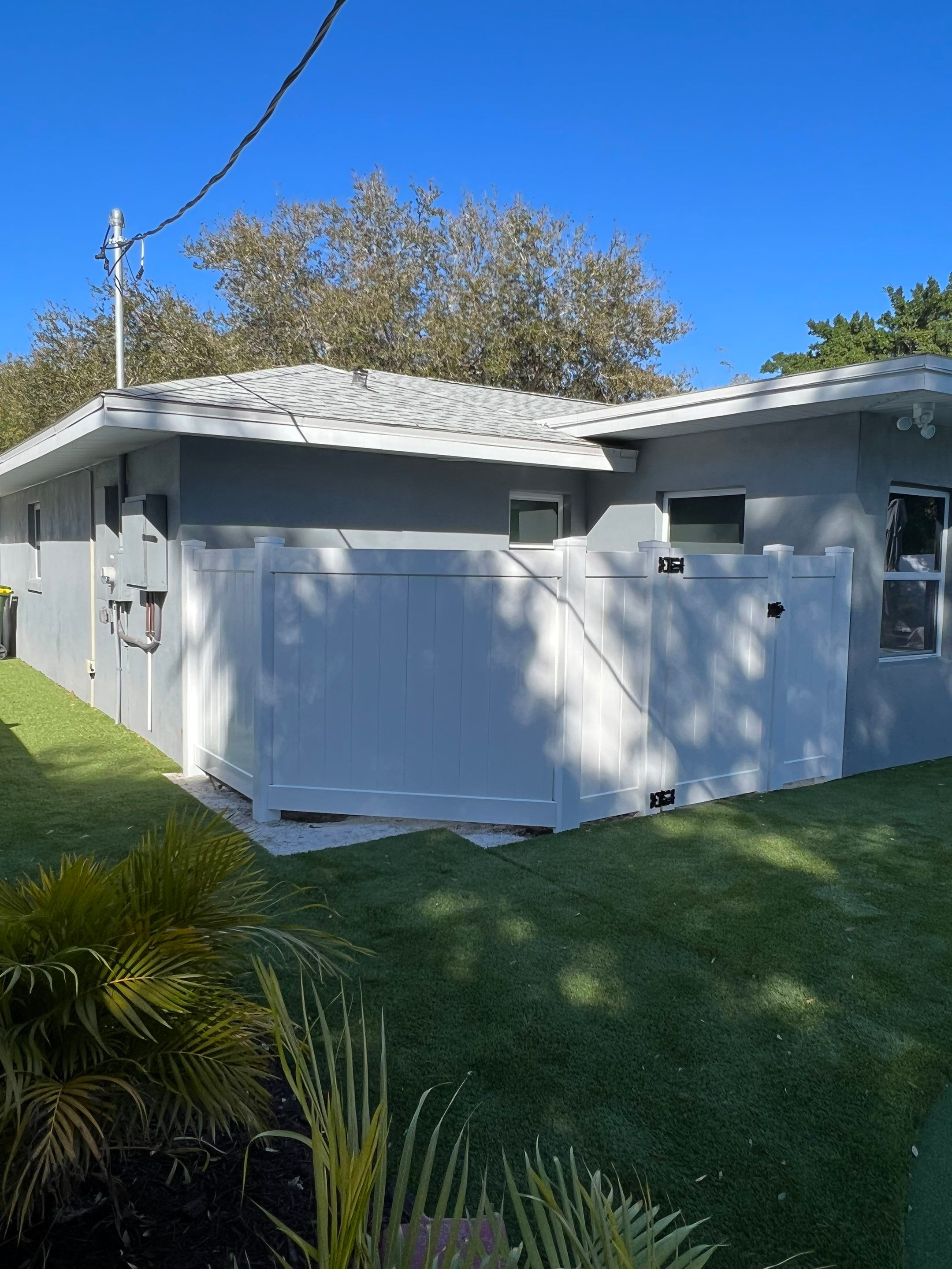 Vinyl Privacy Fence With AC Enclosure and Storage Corral by Asap fence and gates, LLC
