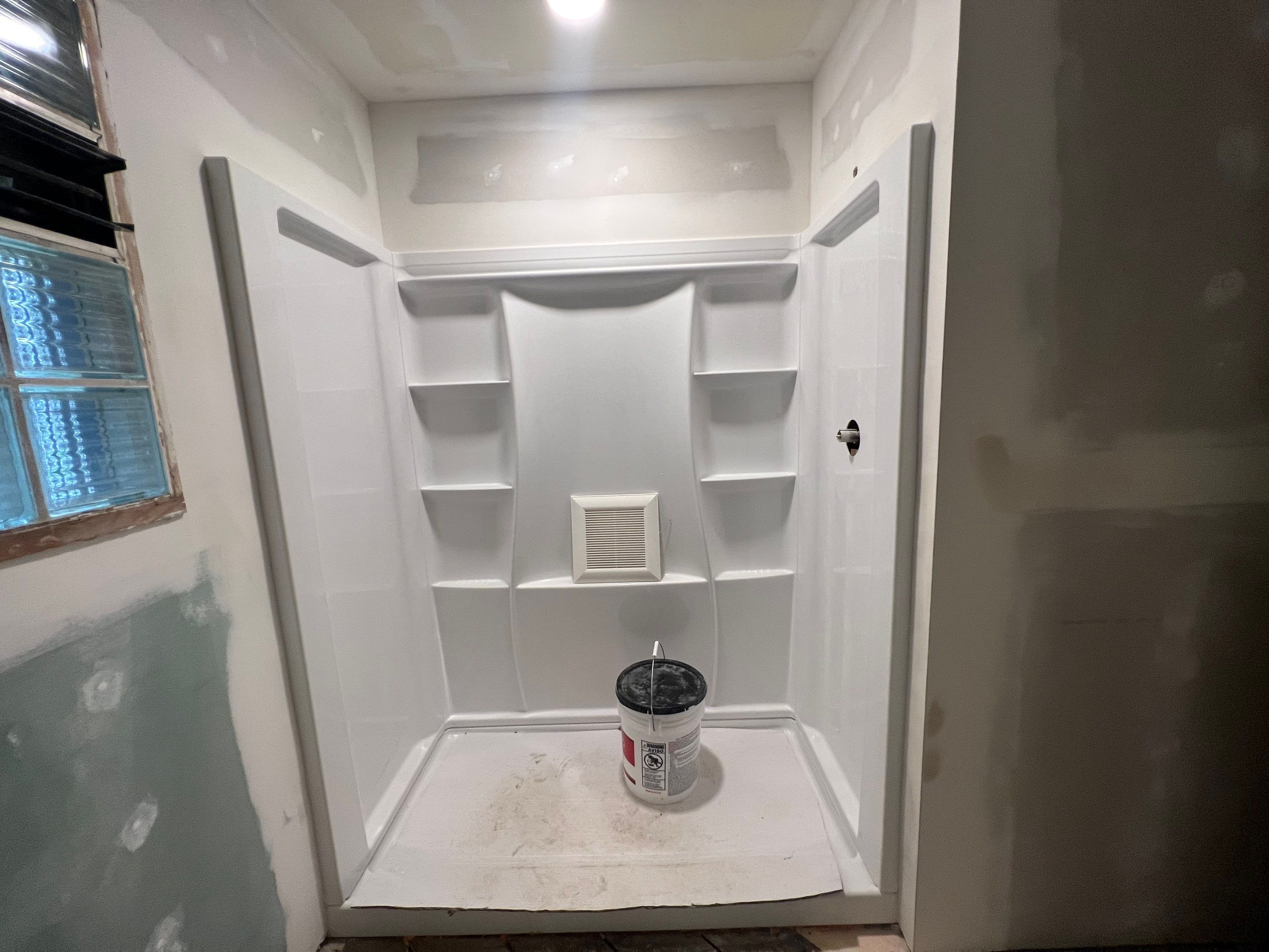 Bathroom Remodel using Shower Kit by Villegas Remodeling, LLC