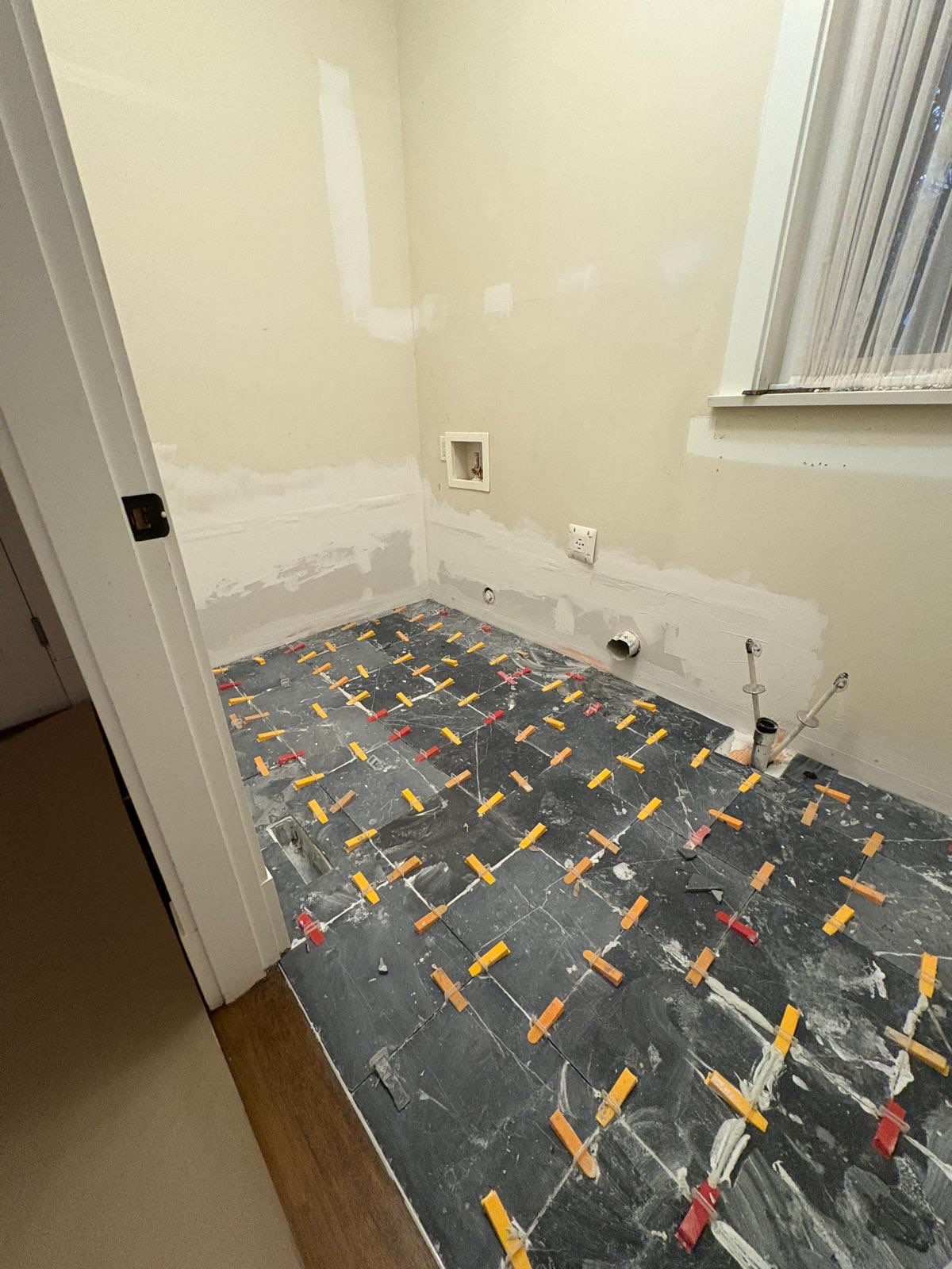 High-End Laundry Room Renovation and Restoration in Vancouver by YVR Construction Group