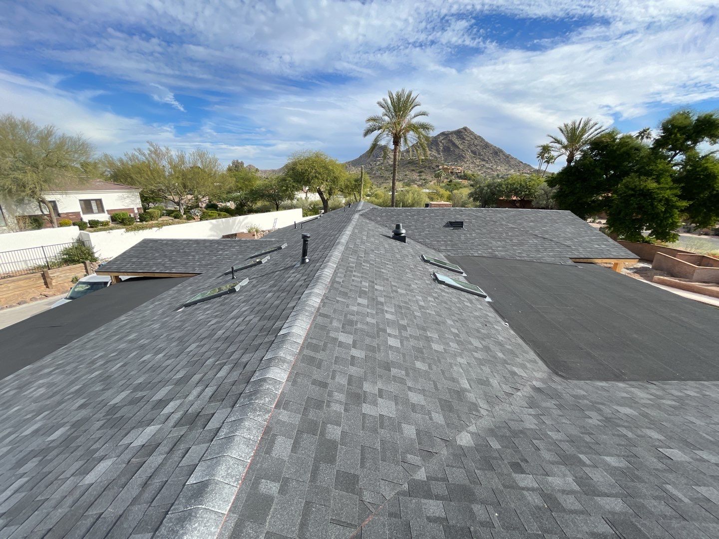 Onyx Black Shingles by Reimagine Roofing