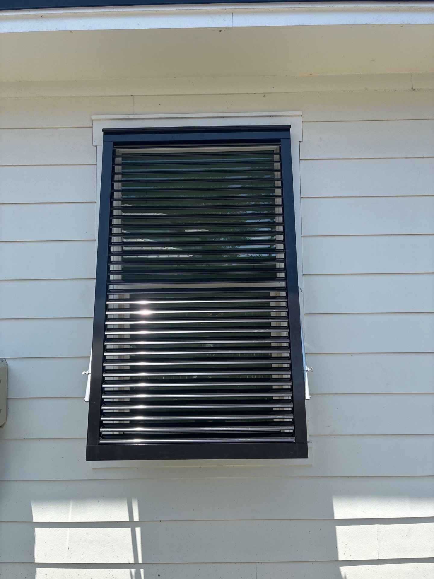 Custom Aluminum Bahama Shutters and Storm Protection in Santa Rosa Beach by Brannan Aluminum Inc.