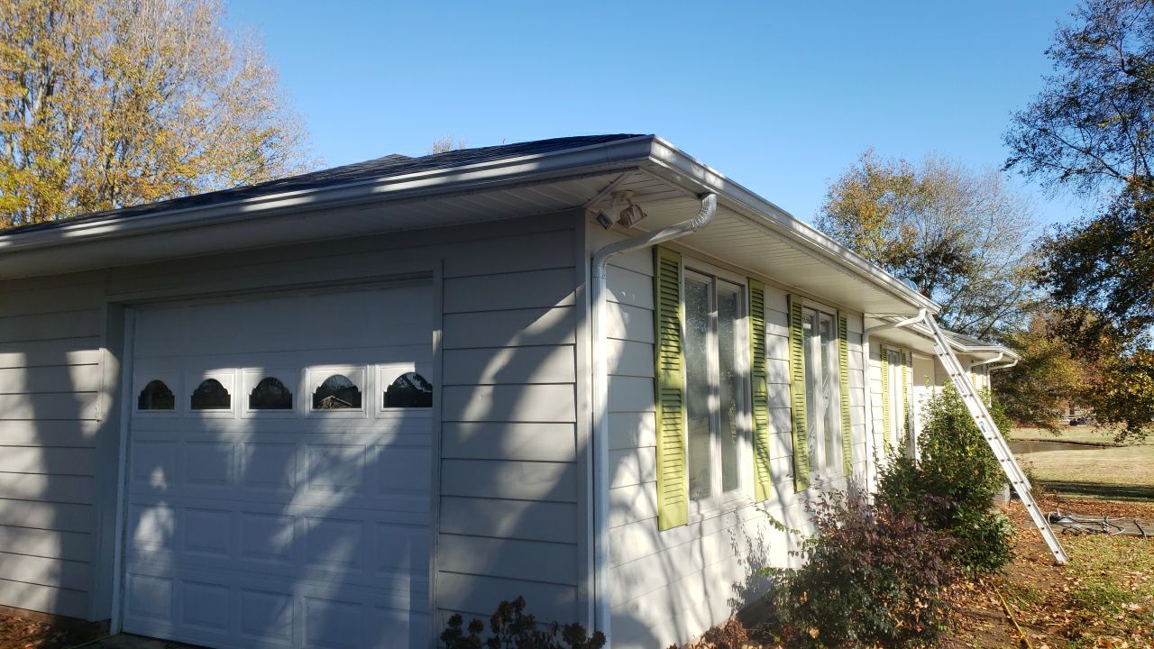 gutter cleaning and house wash and gutter guard installation by Power Wash Masters LLC