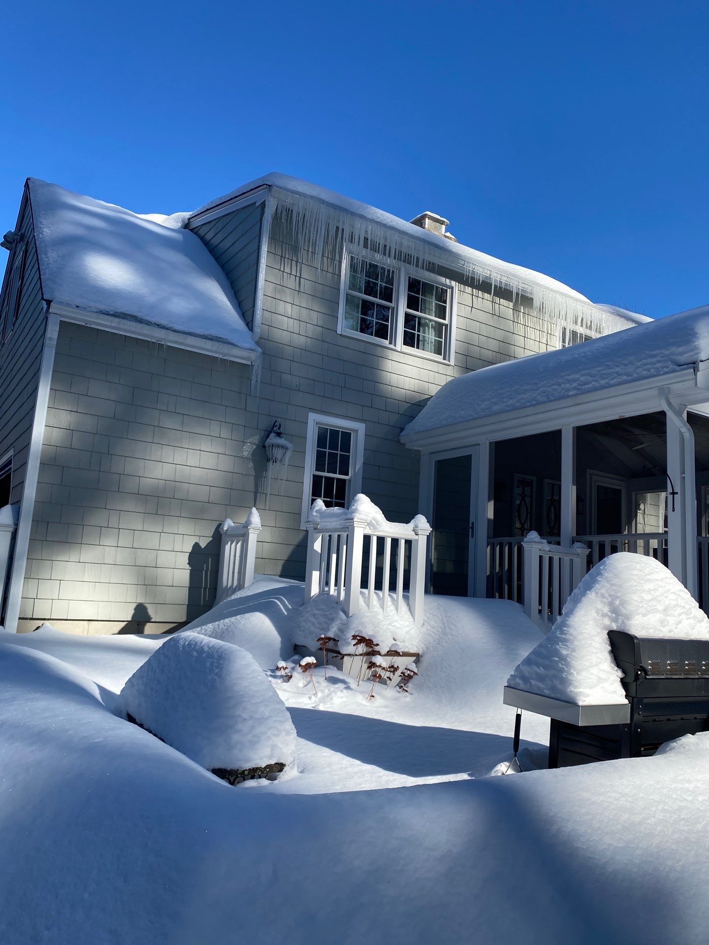 Snow removal by Mighty Dog Roofing of Greater Middlesex County