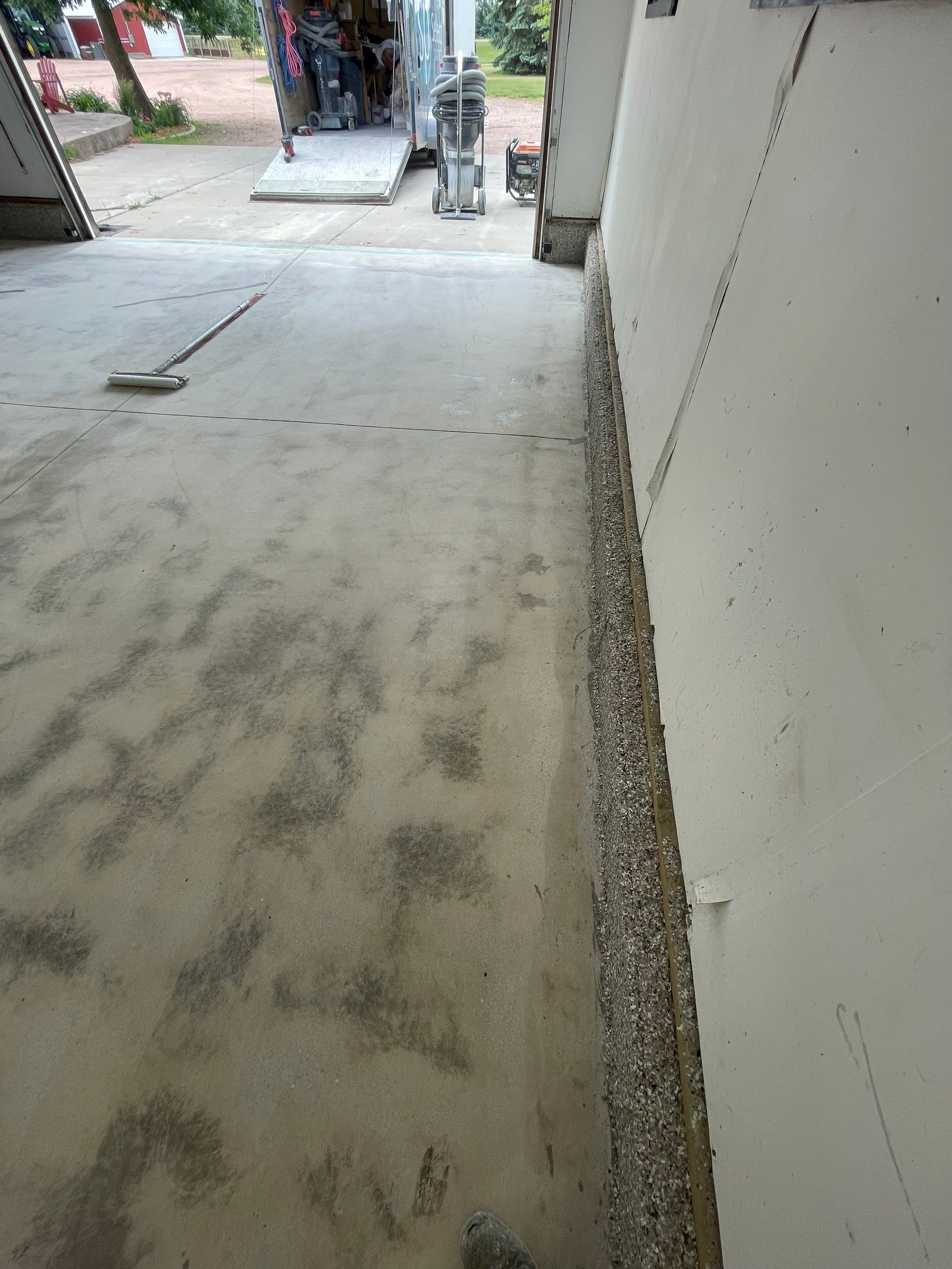 Hartford Residential Garage Floor Transformation With Decorative Chip Coating by Select Painting, Coatings & Garage Cabinets