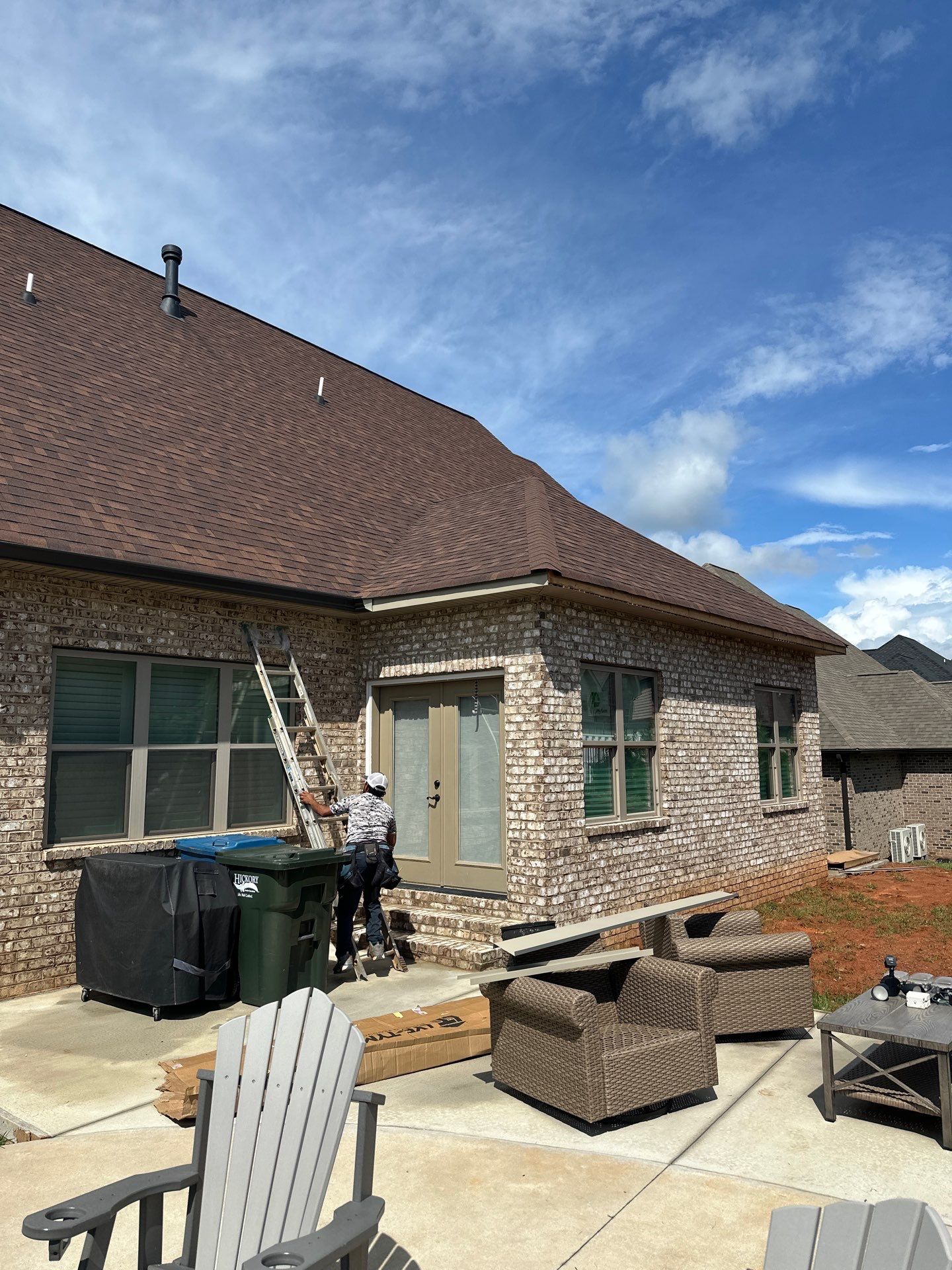 6" Seamless Gutters in Dark Bronze by Peak 2 Peak Services LLC