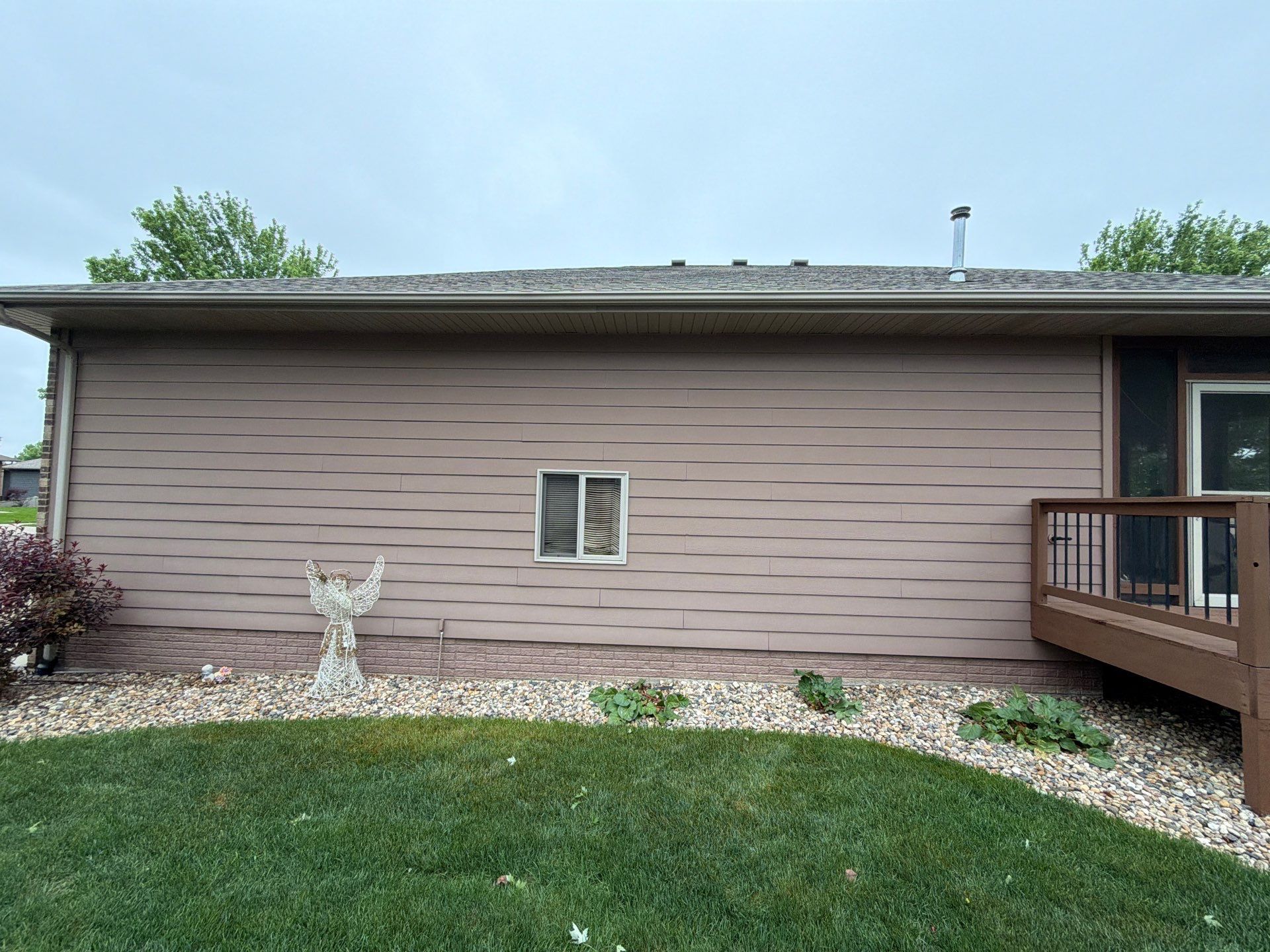 Exterior Painting and Wooden Deck Staining in Sioux Falls by Select Painting, Coatings & Garage Cabinets