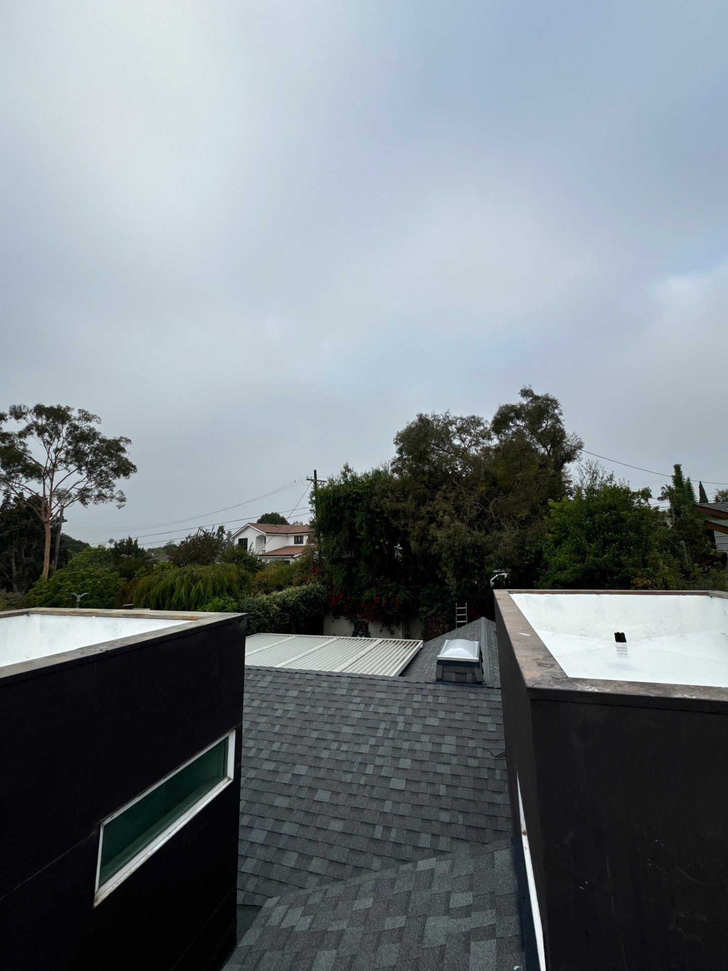 Residential Roofing Installation using Shingles and Silicone by Hull Brothers Roofing