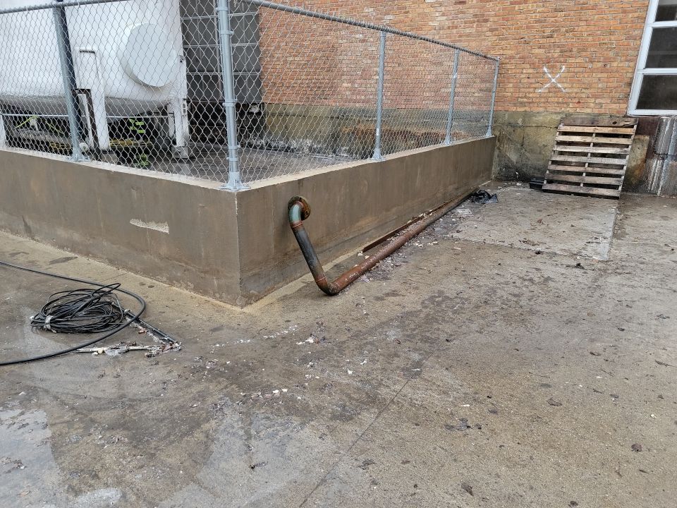 commercial pressure washing using Hot water by Northern Power Washing LLC.