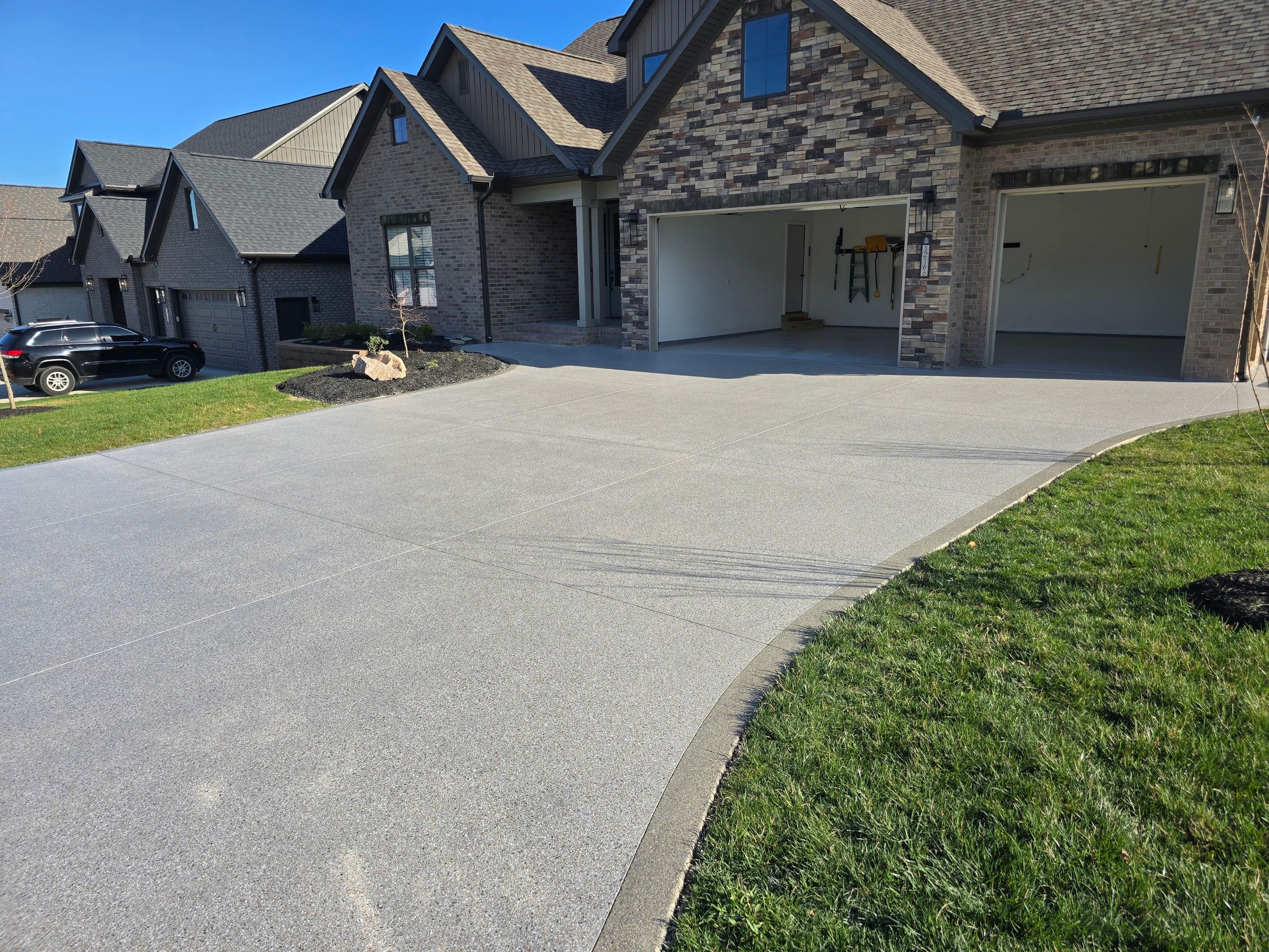 Driveway Using Claystone & Trail Mix Match by Elite Floor Solutions