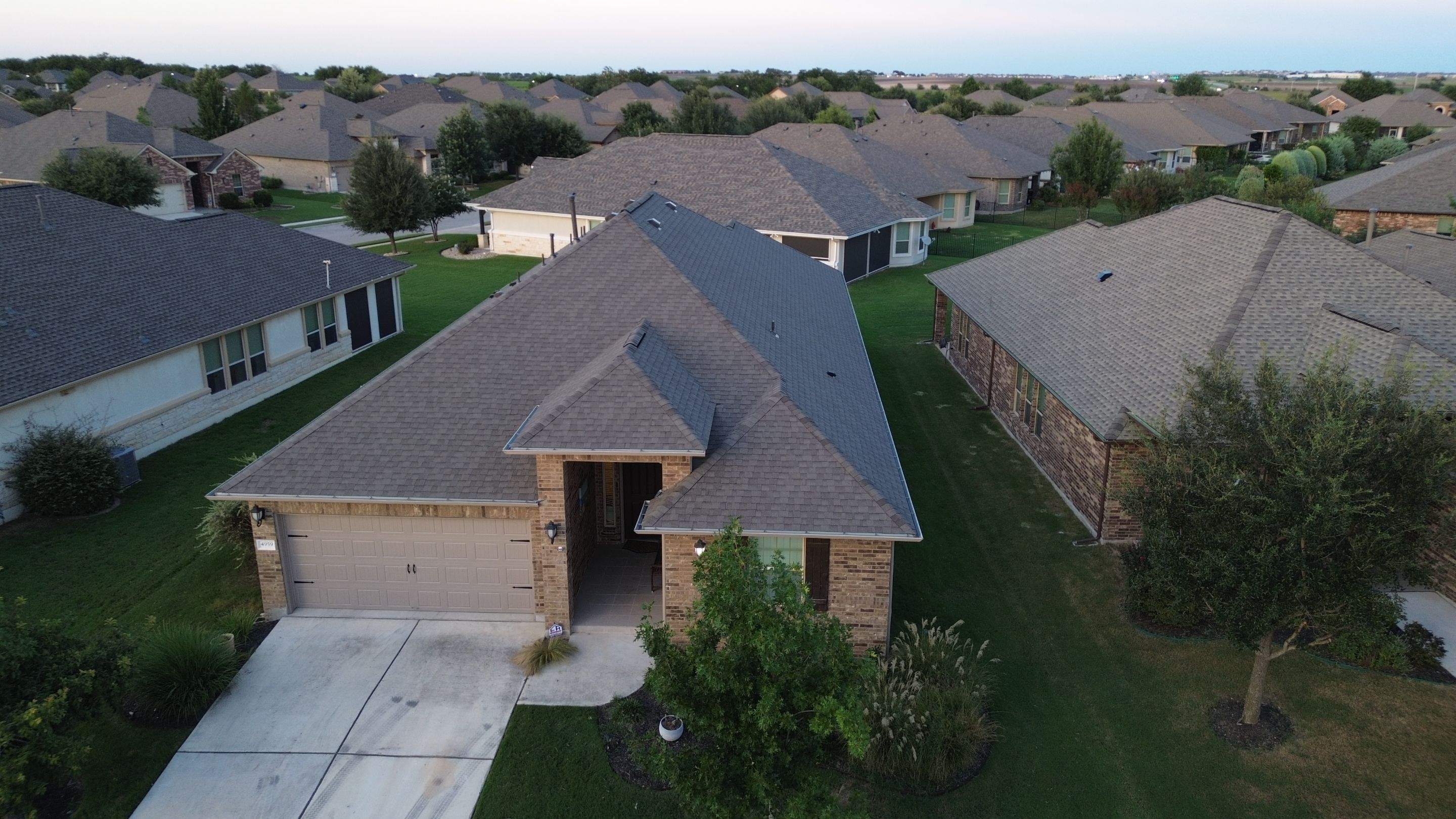 IKO Cambridge Weathered Wood by DeZign Roofing & Exteriors