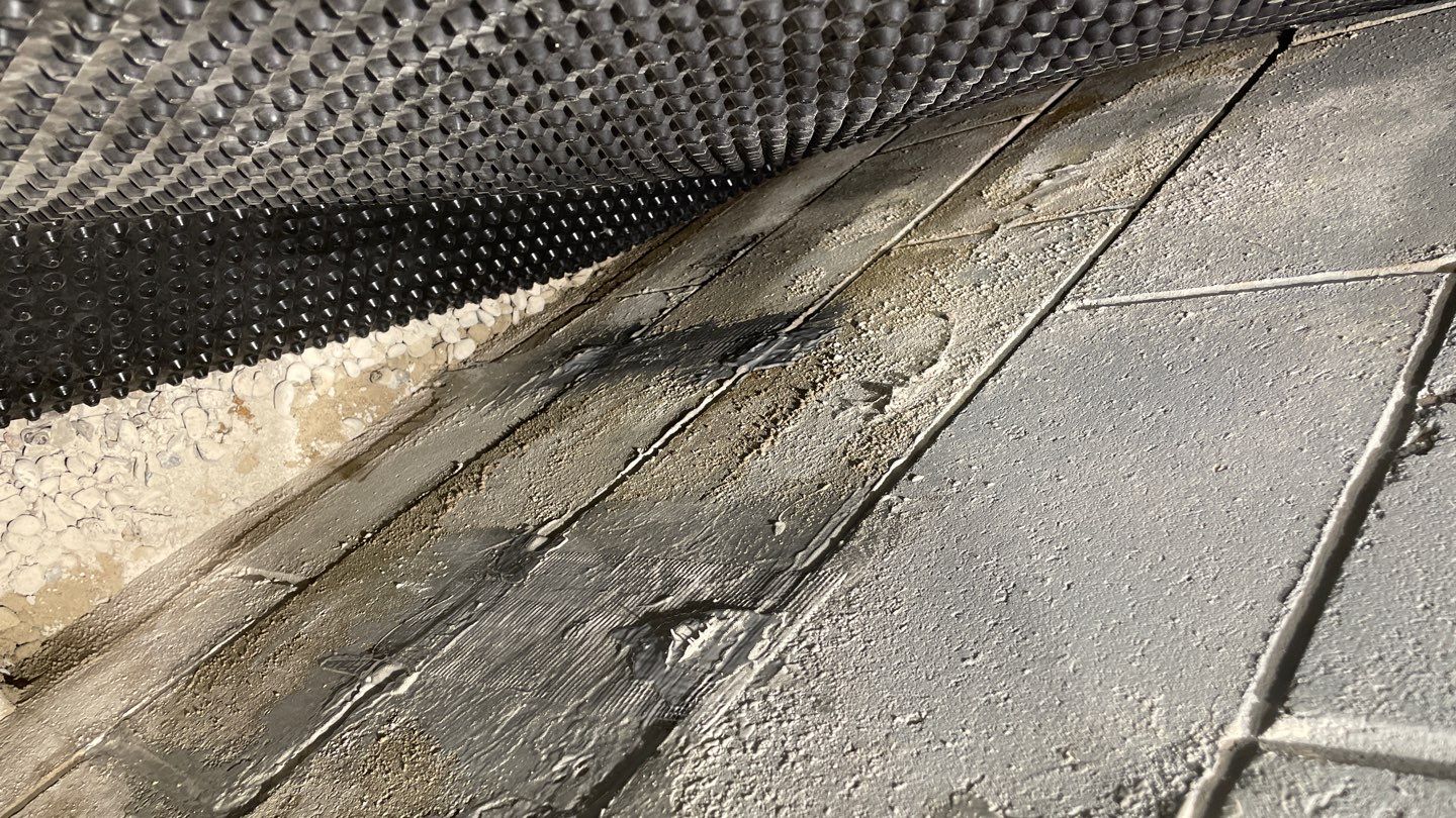 Interior Drain Tile & Sump Pump System in West Minneapolis by Waterproofing Northeast