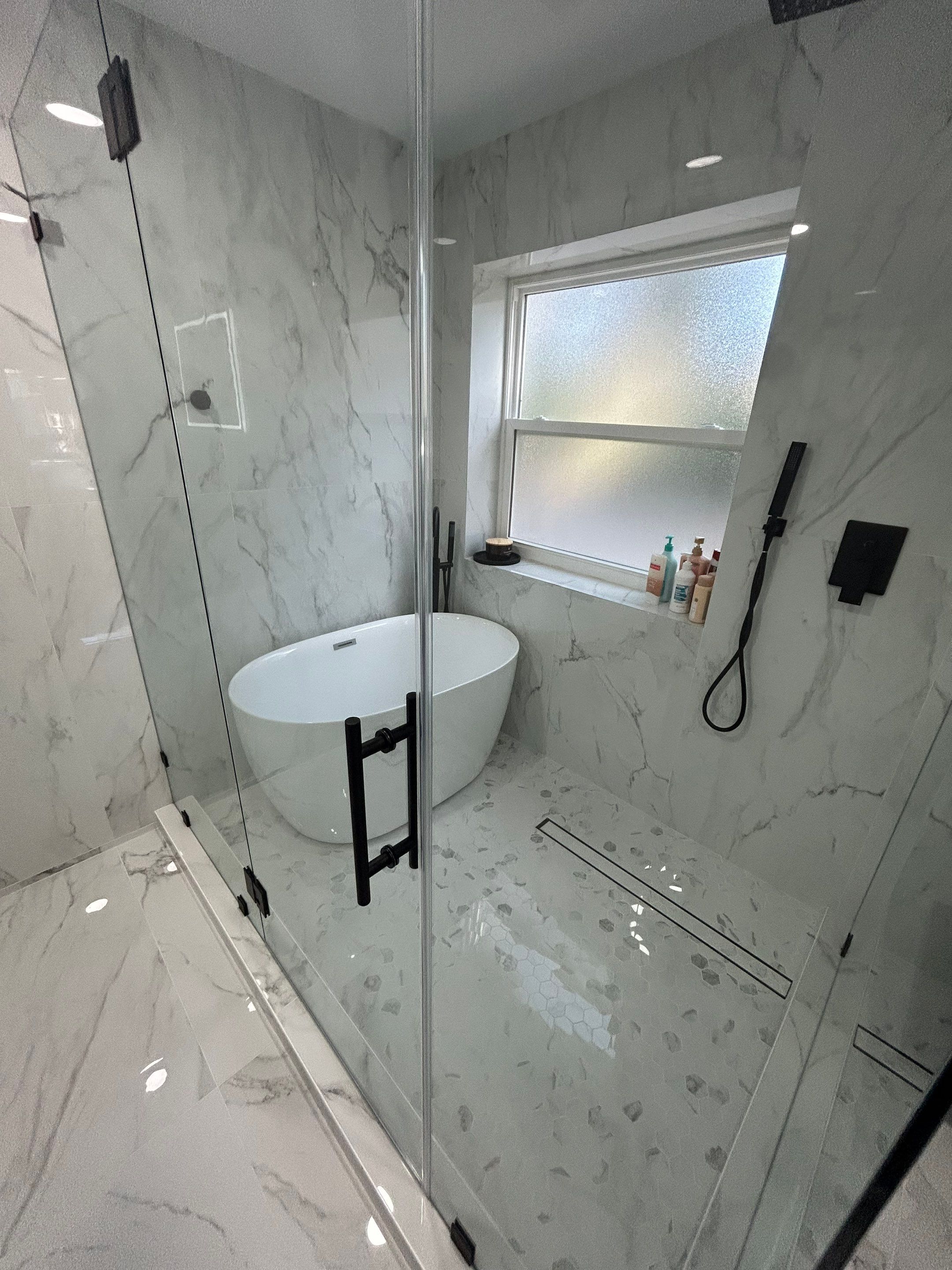 Master Bathroom, Children's Bathroom, and Fireplace Renovation by urban green energy llc