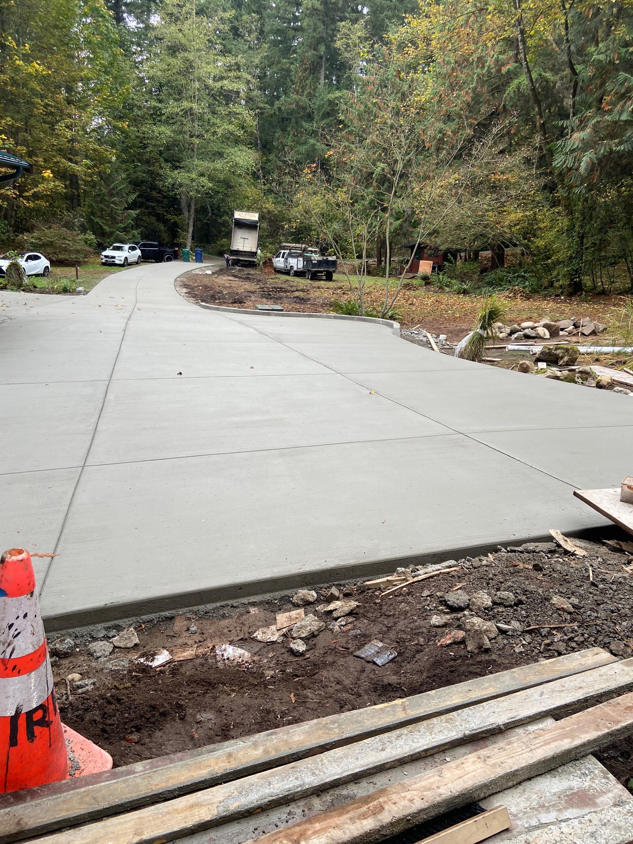 Pia | Custom Concrete Driveway, Walkway & Floating Steps by Jireh Asphalt & Concrete Inc 