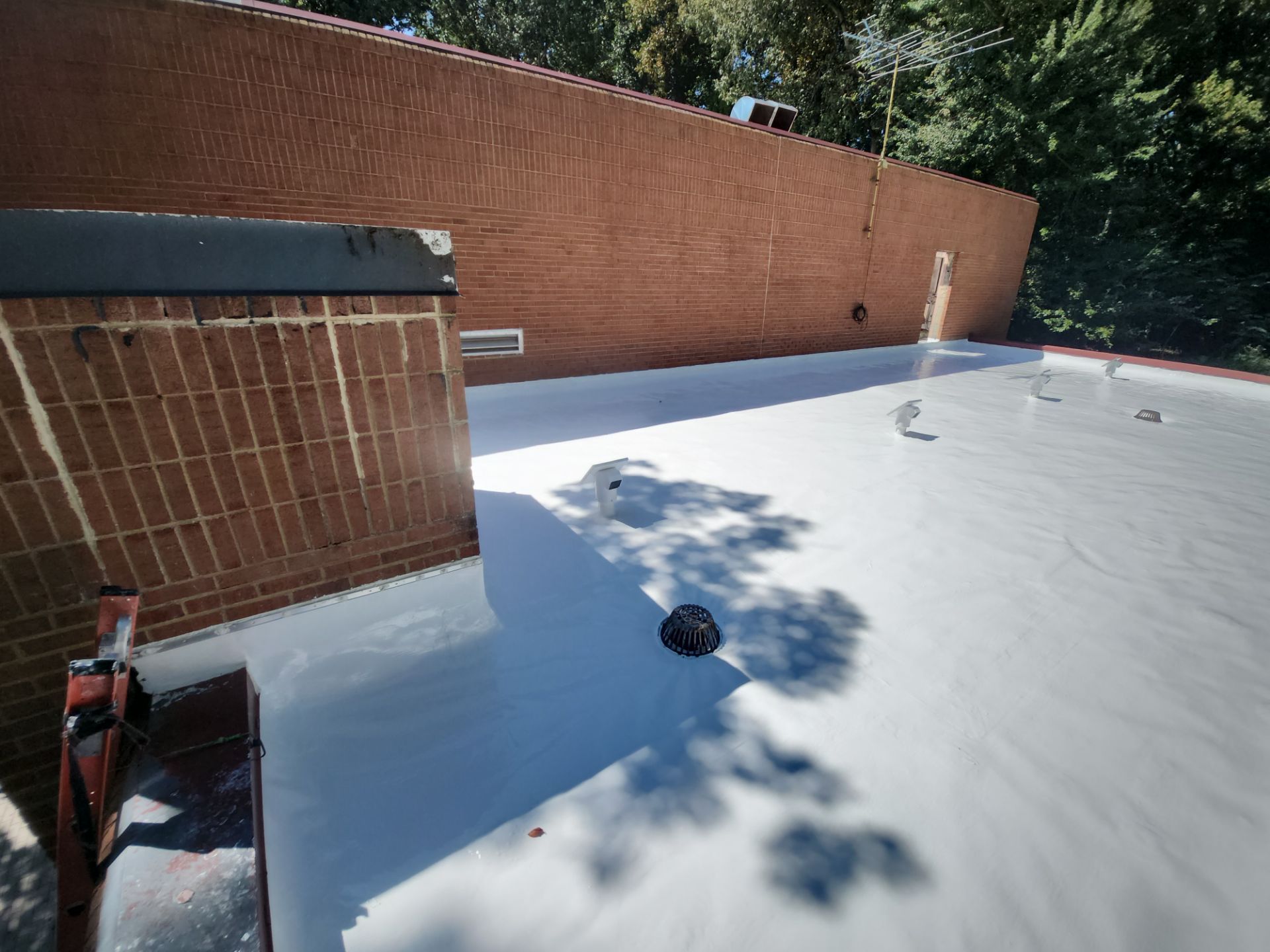 Roof Installation using Silicone TPO by ExteriorPros