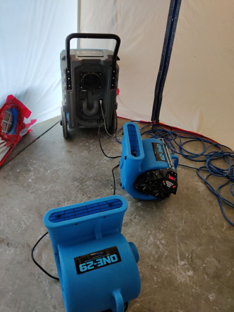 Water Damage in Garage by Accountable Home Services