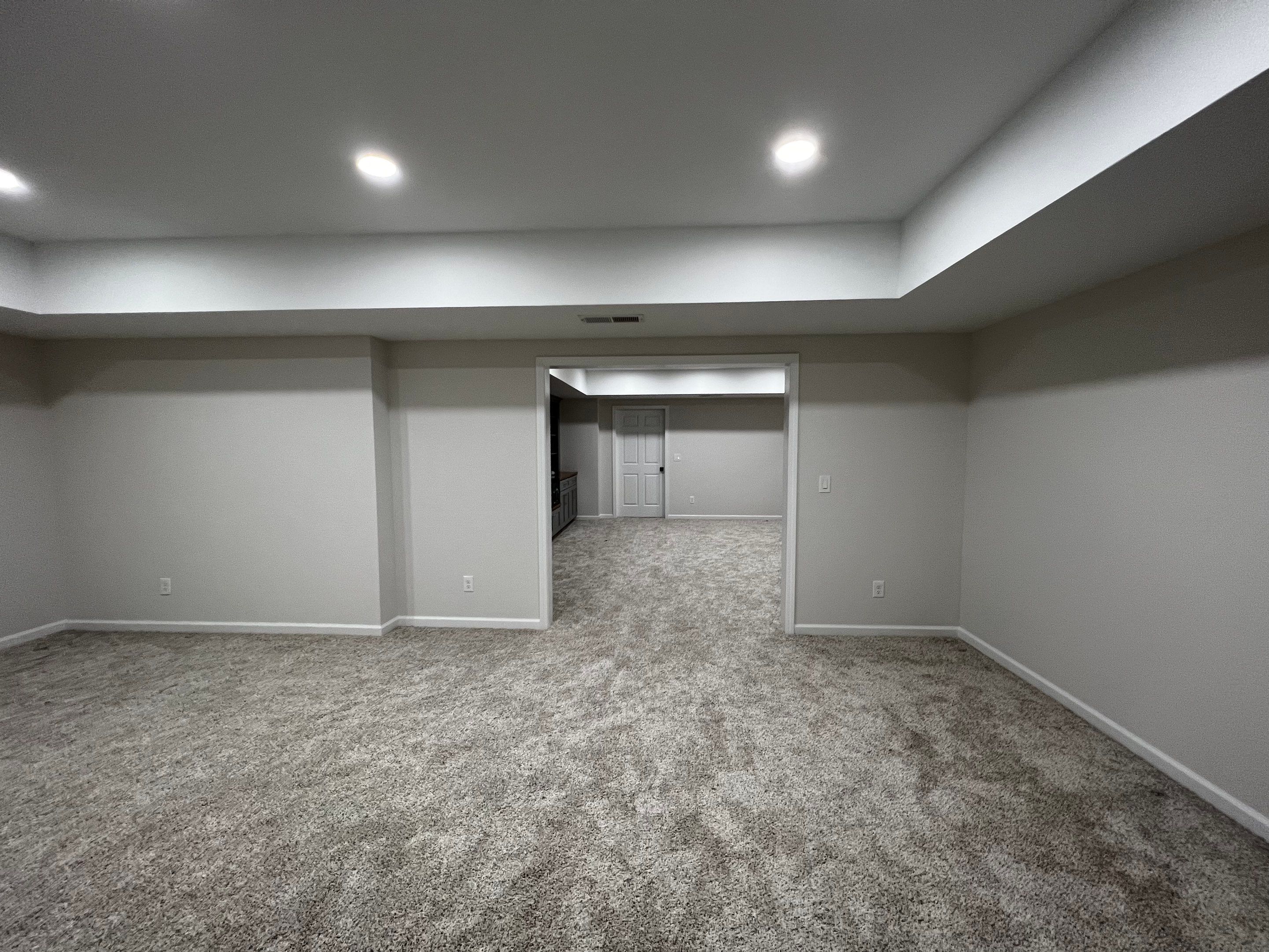 Finished Basement with Custom Built-ins and Full Bathroom in Acworth by Swift Home Renovations