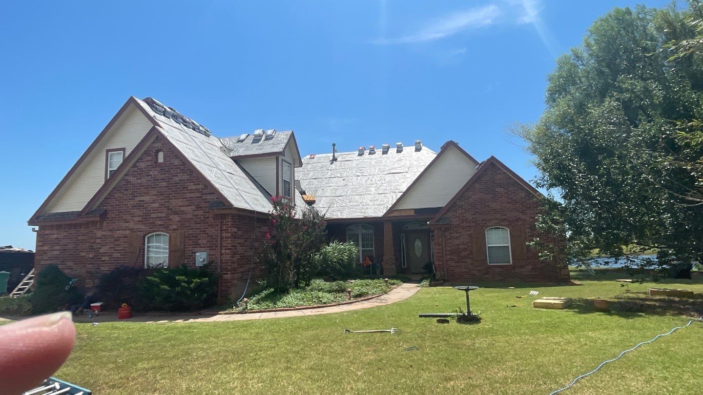 Residential Roofing Installation using GAF Natural Shadow  by A & H Roofing and Contracting