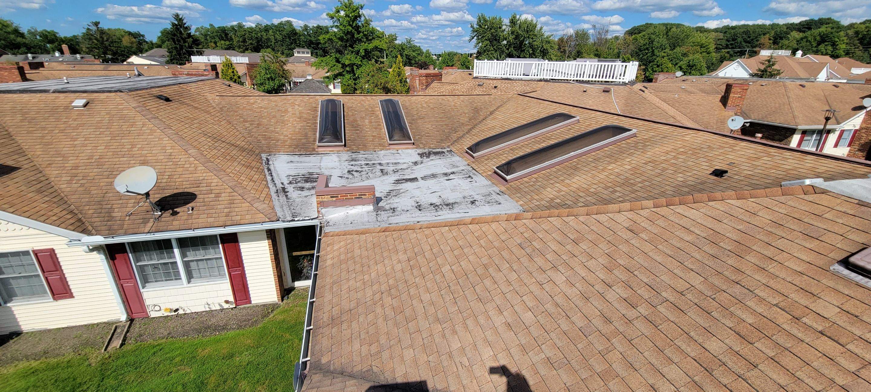 Skylight removal and install  by Absolute Roofing and Construction