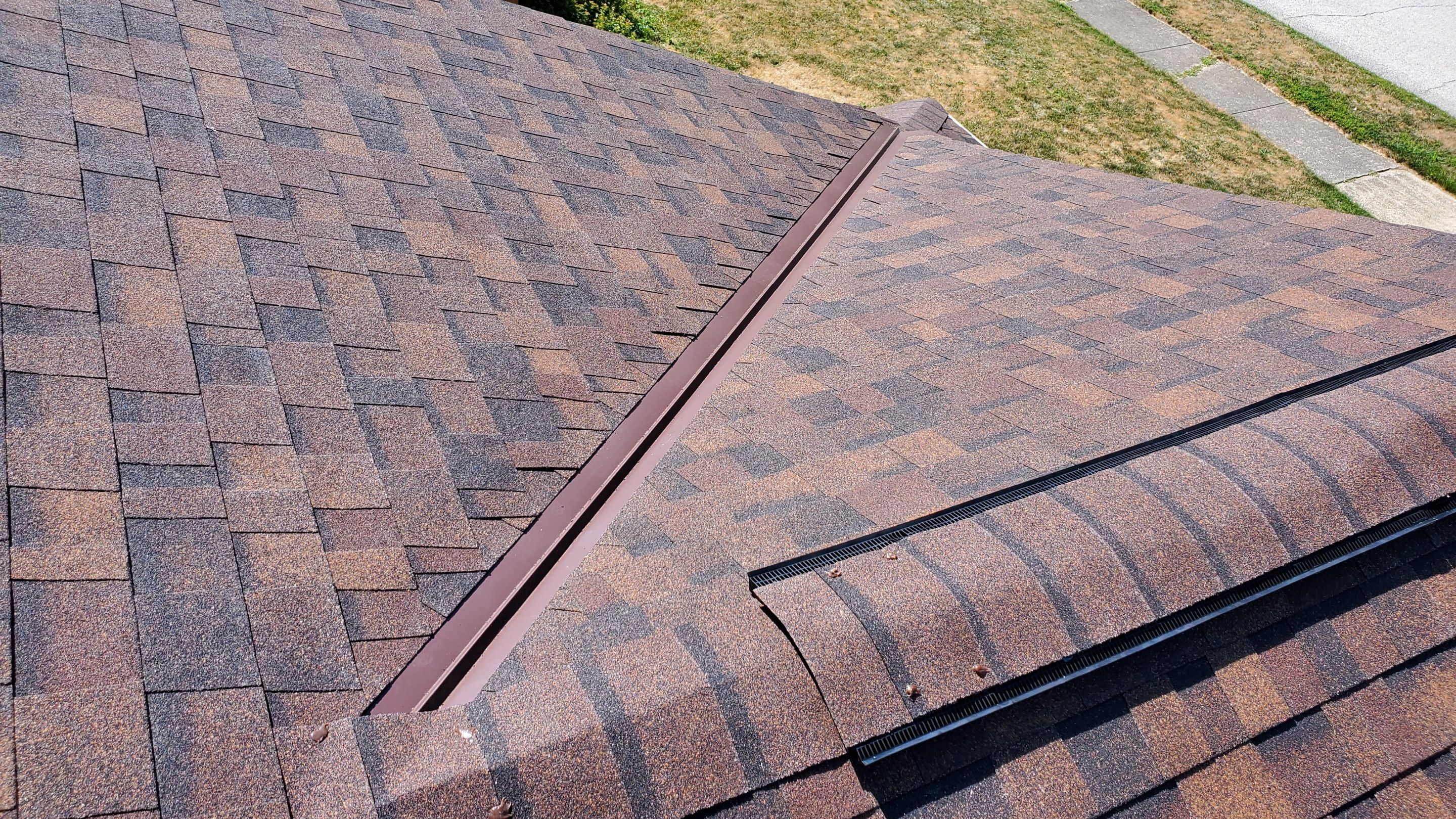 Residential Roofing Installation using Ownens Corning Duration Brownwood by Absolute Roofing and Construction