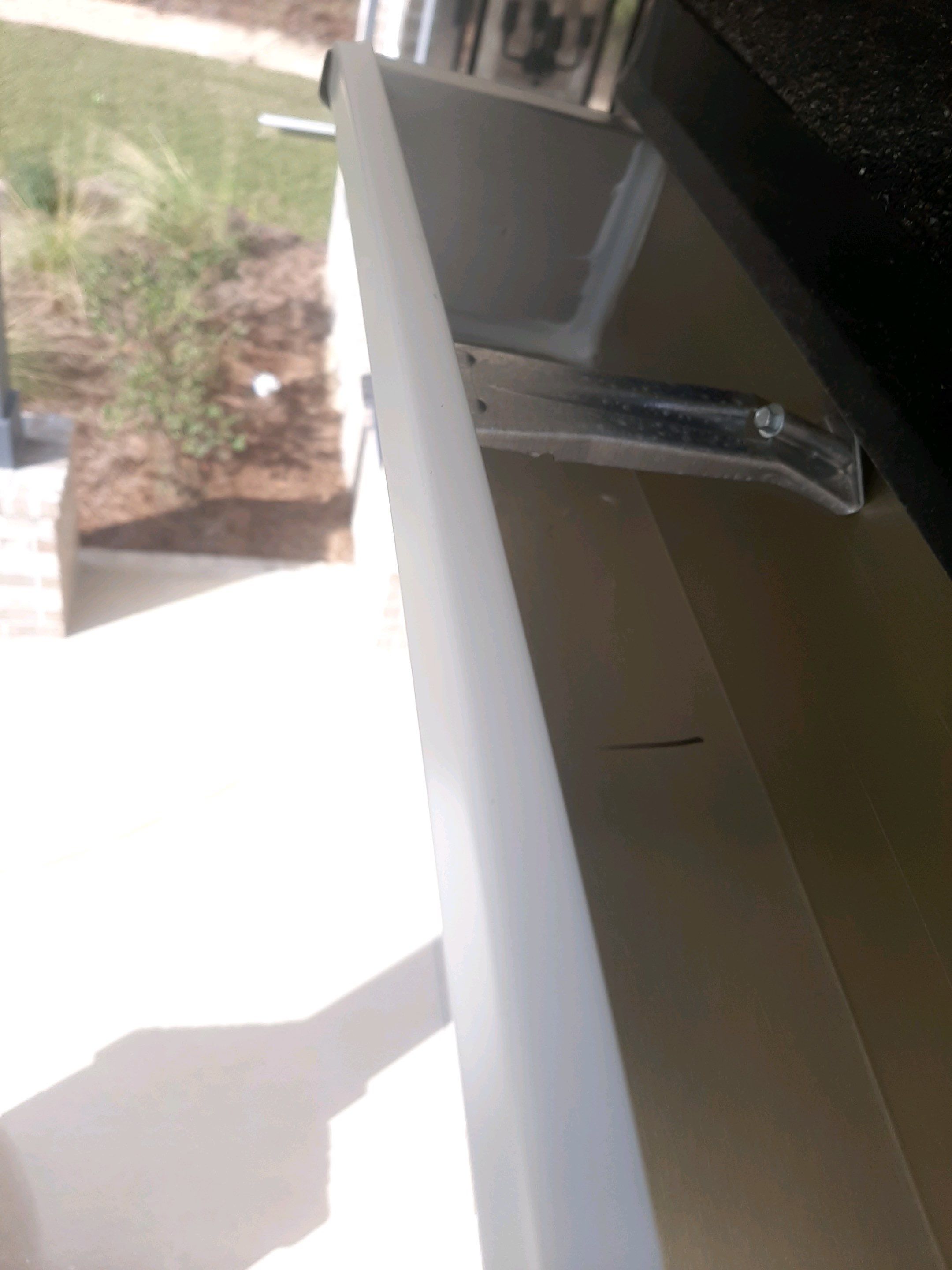 Seamless Gutter Installation Using White K-Style Gutters by Gutter Professors