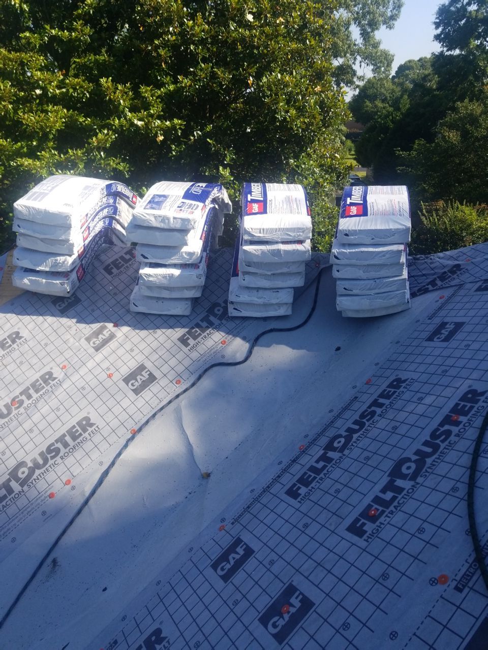 Residential Roofing Installation using Roof Replacement by American Roofing & Construction LLC