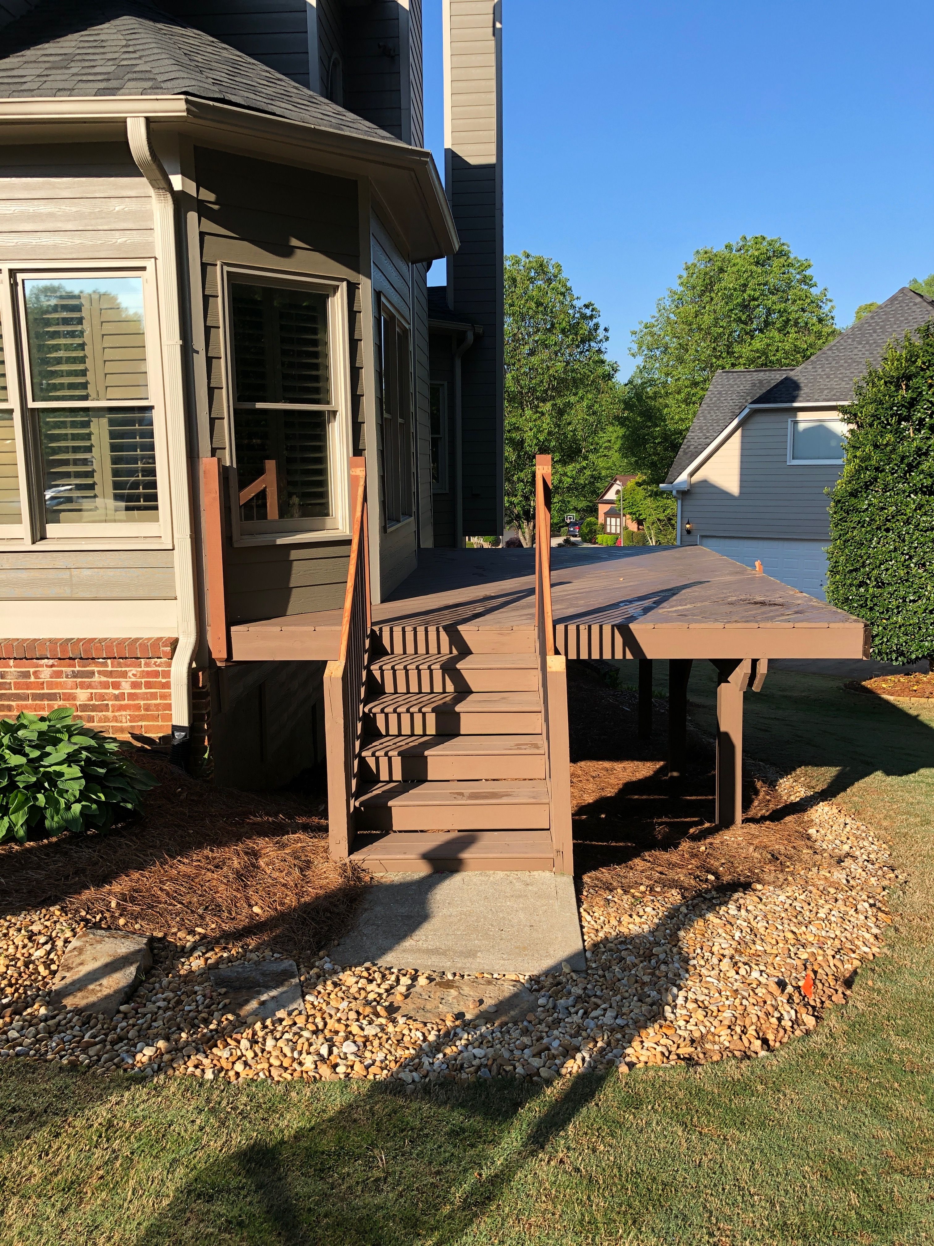 Covered Porch and Composite Deck Addition in Woodstock by Swift Home Renovations
