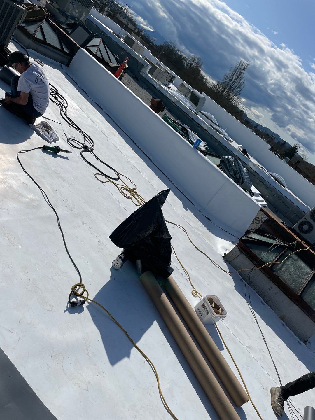 Commercial Flat Roof Installation using GAF 60Mil TPO  by Orezona Building & Roofing Company, Inc.