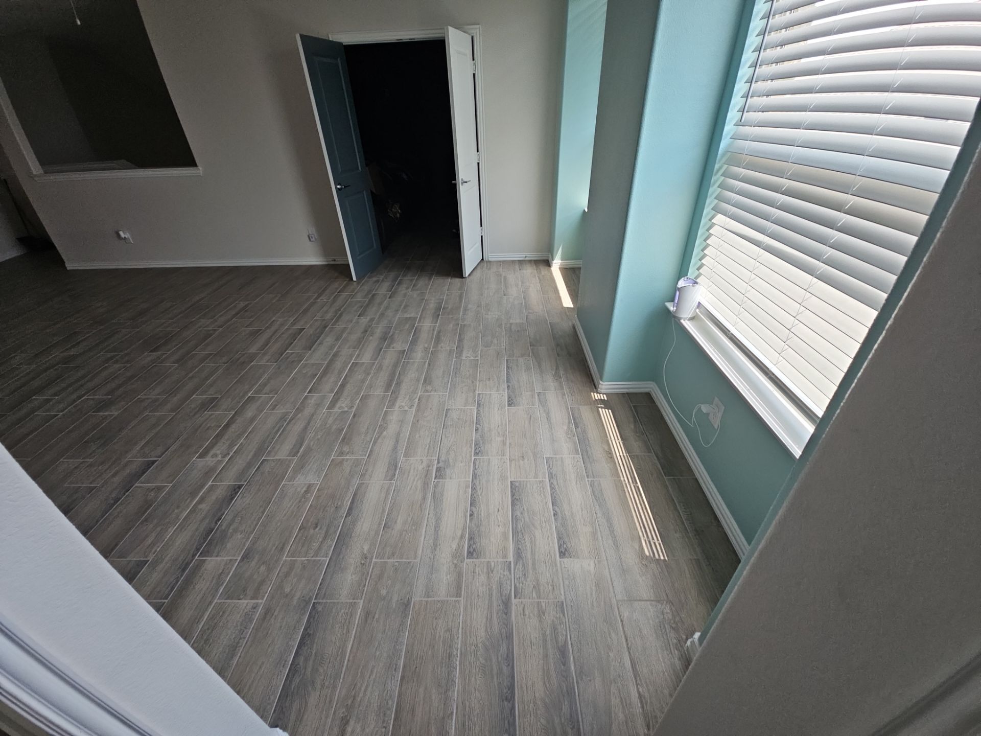 Carpet replacement with Tile and Red Oak Stairs by EL-GC LLC 