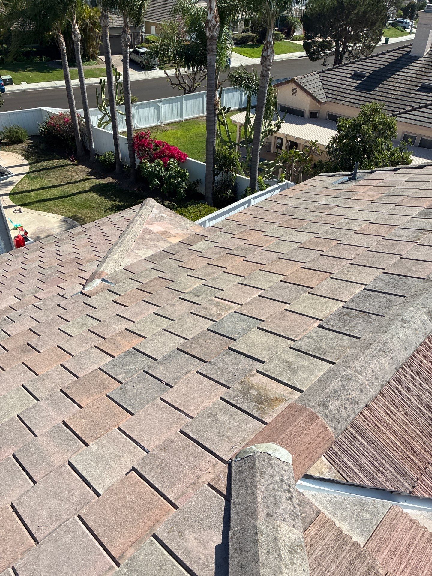 Carlsbad Concrete Tile Roof Replacement with Copper Flashing and Skylights by Reliable Roofing San Diego Inc.
