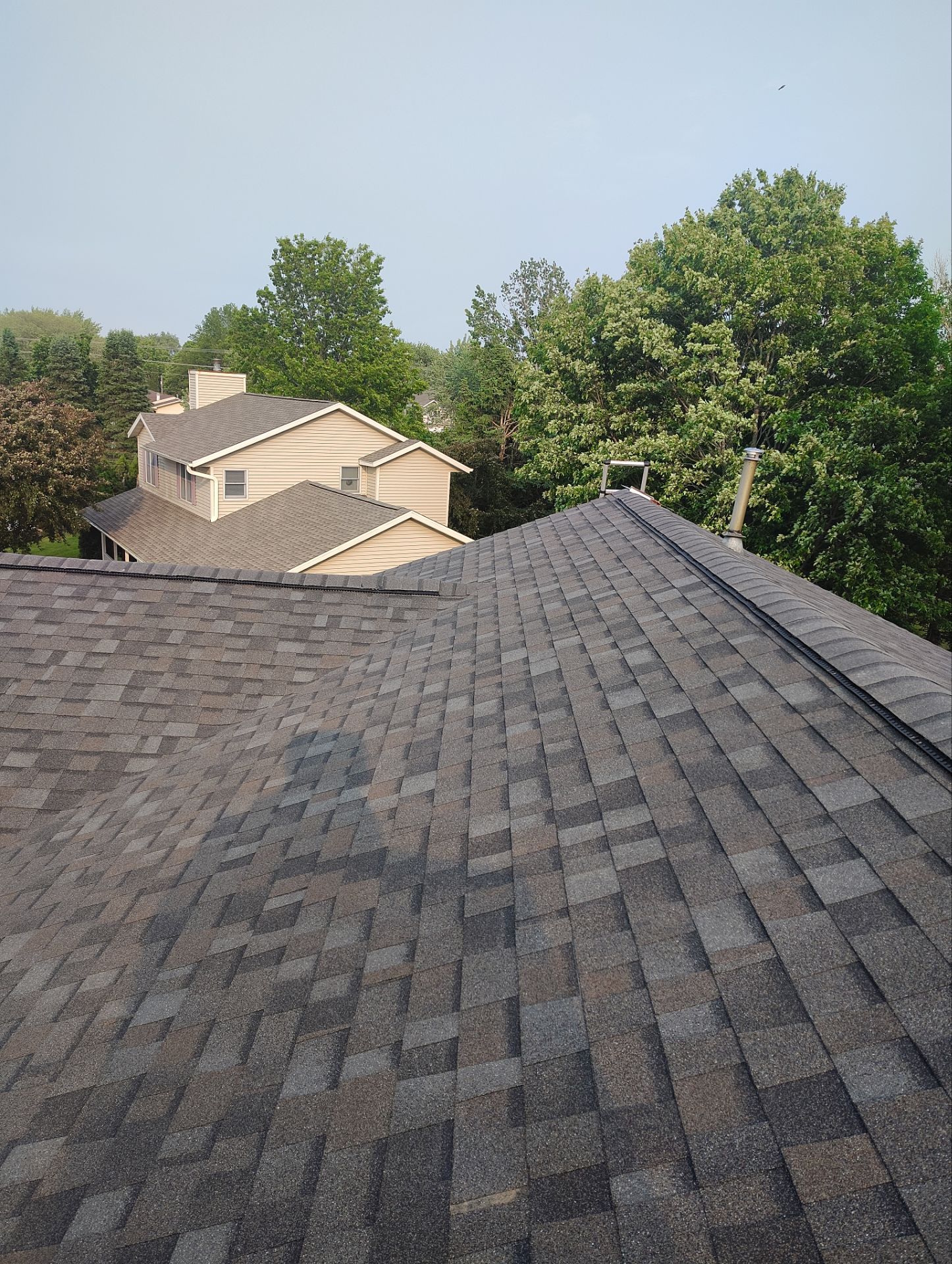 H.F.: Roofing and siding by AFC Exteriors