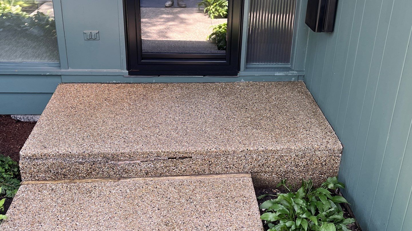 Aggregate concrete cleaning and sealing using Surebond SB-9000 by Northern Power Washing LLC.