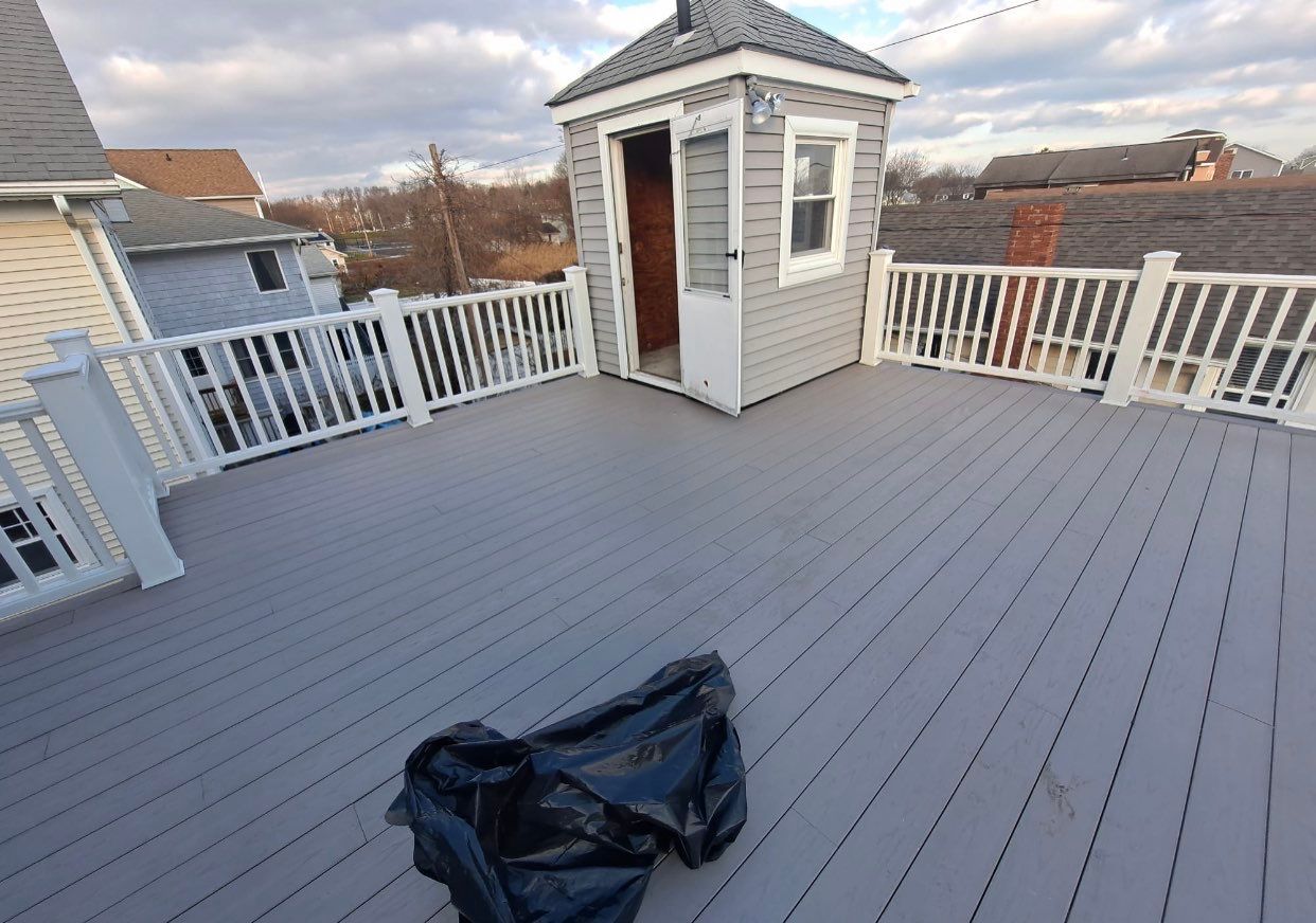 Deck Installation using trex over epdm roof by A Plus Exterior