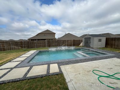 Geometric Pool with Contrasting Paver Deck