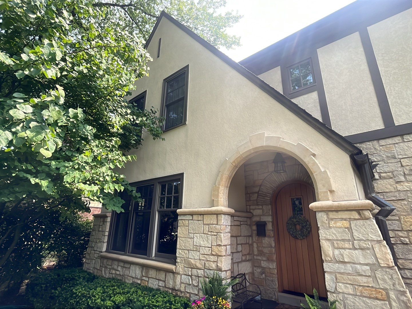 Northbrook, IL stucco home soft wash and stone cleaning by Northern Power Washing LLC.