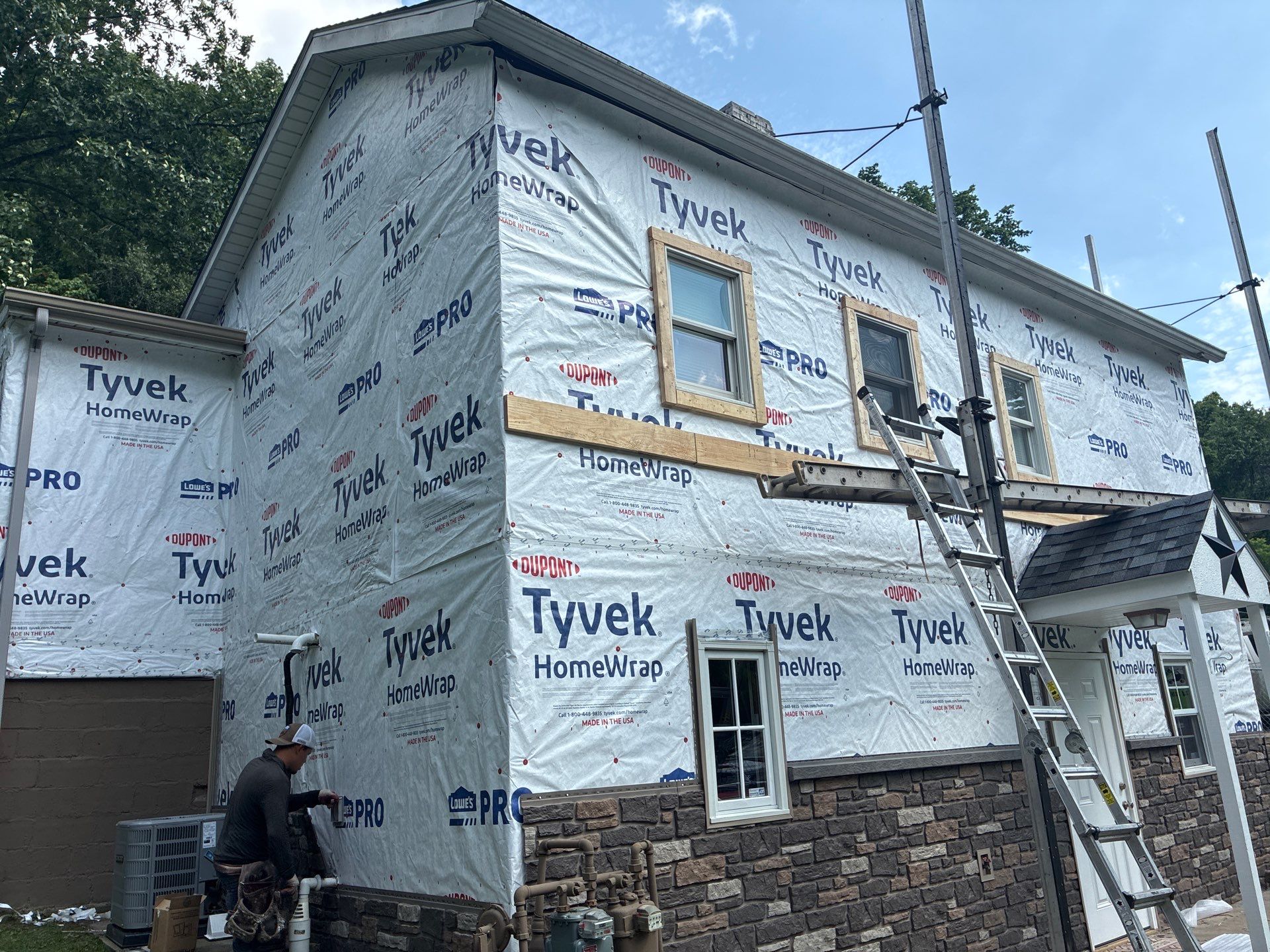 Jefferson Hills Vertical Board and Batten Siding and TandoStone Renovation by Ideal Siding Pittsburgh
