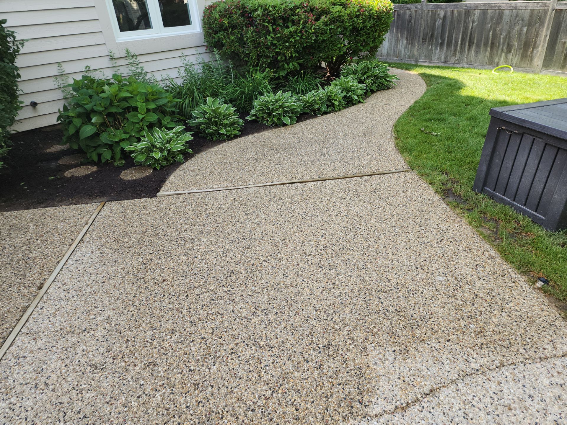 Aggregate concrete cleaning by Northern Power Washing LLC.