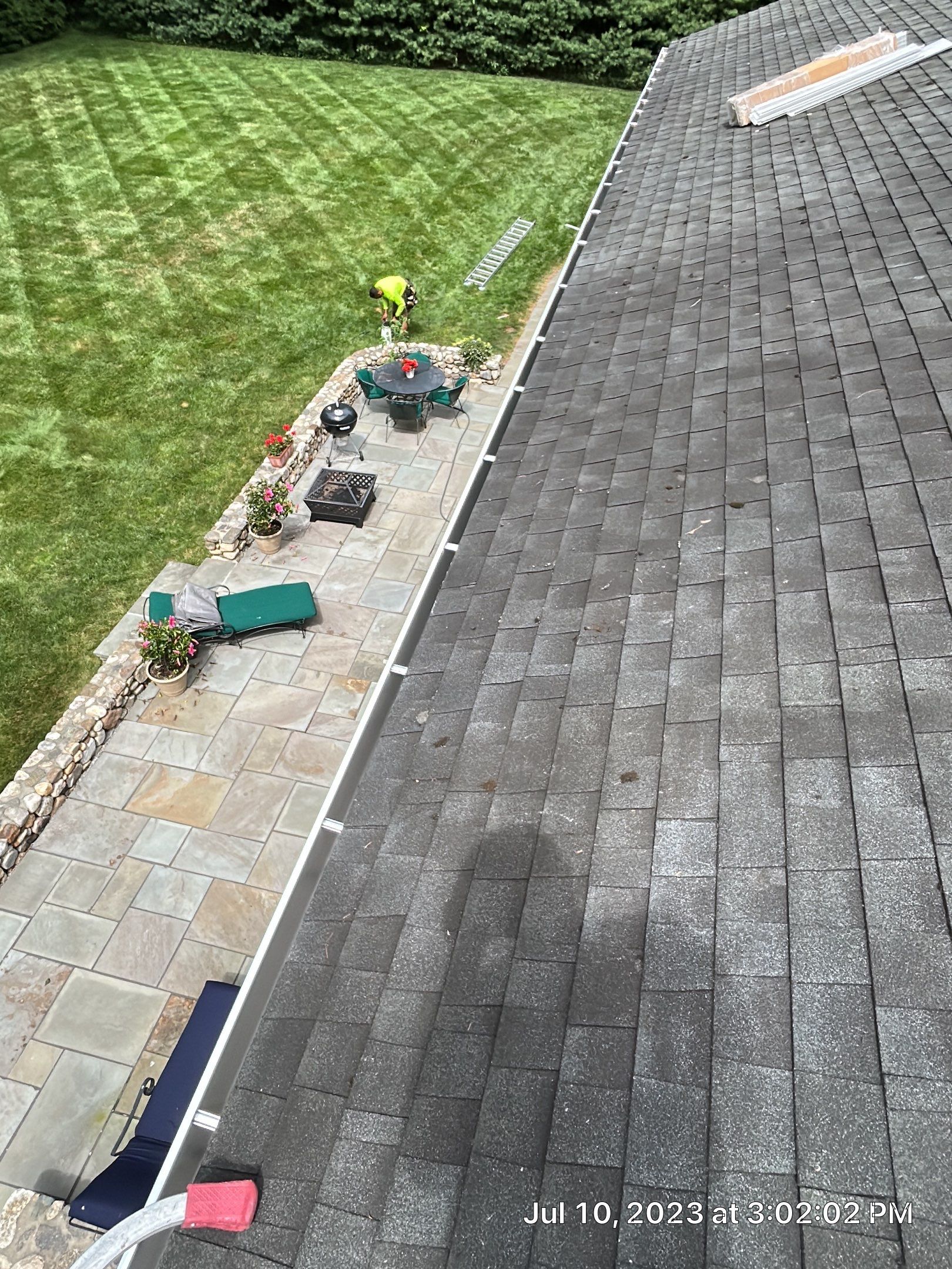 Gutter Installation using White gutters and roof clean up by A Plus Exterior
