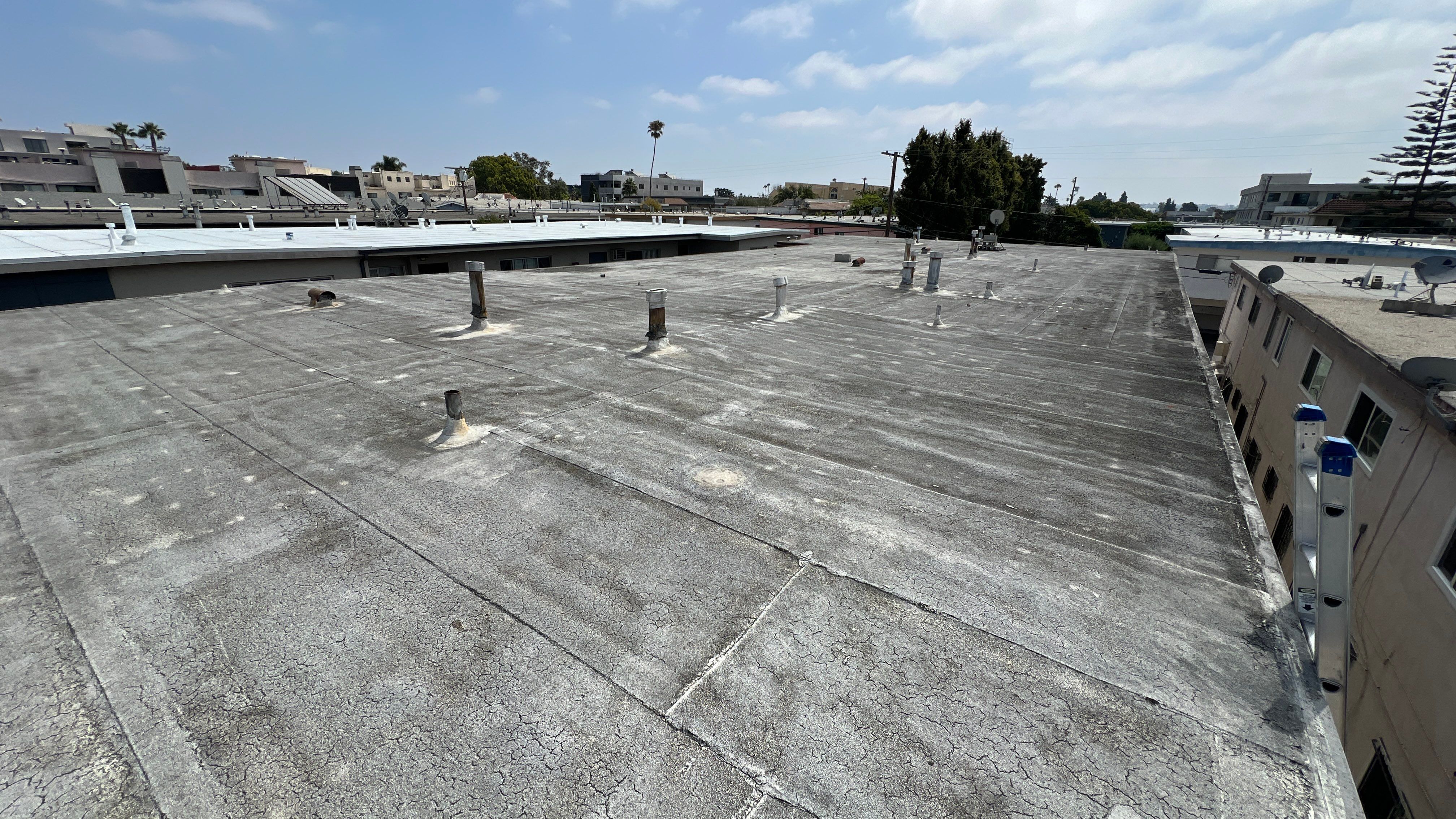 Commercial Roofing Installation using Silicone Coating by Hull Brothers Roofing