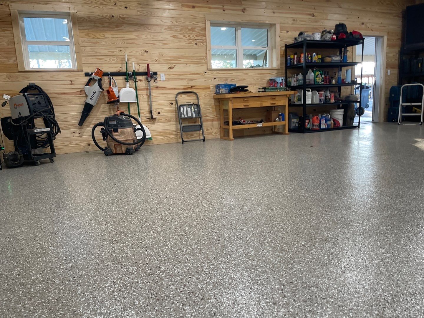 Garage and Carport in Chiefland, FL in Pebble Beach by Cross Creek Concrete Coatings