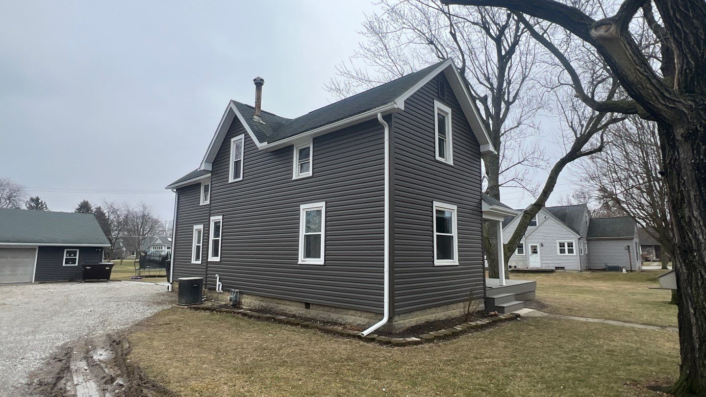 Residential fascia replacement using Exterior Portfolio 4.5 DL - Peppercorn by Nitro Roofing and Construction