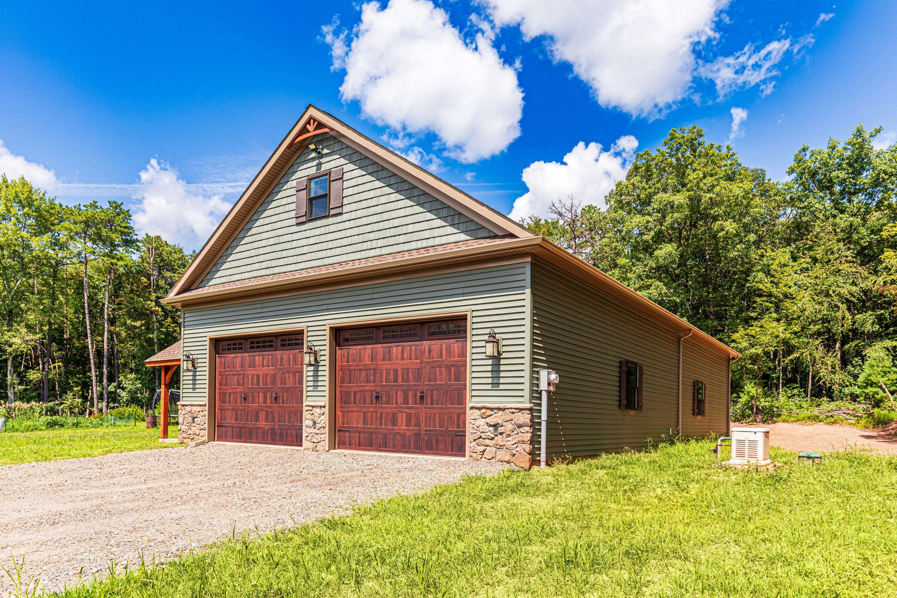 Custom Two-Story Garage with Finished Upper Leve by Esh Builders