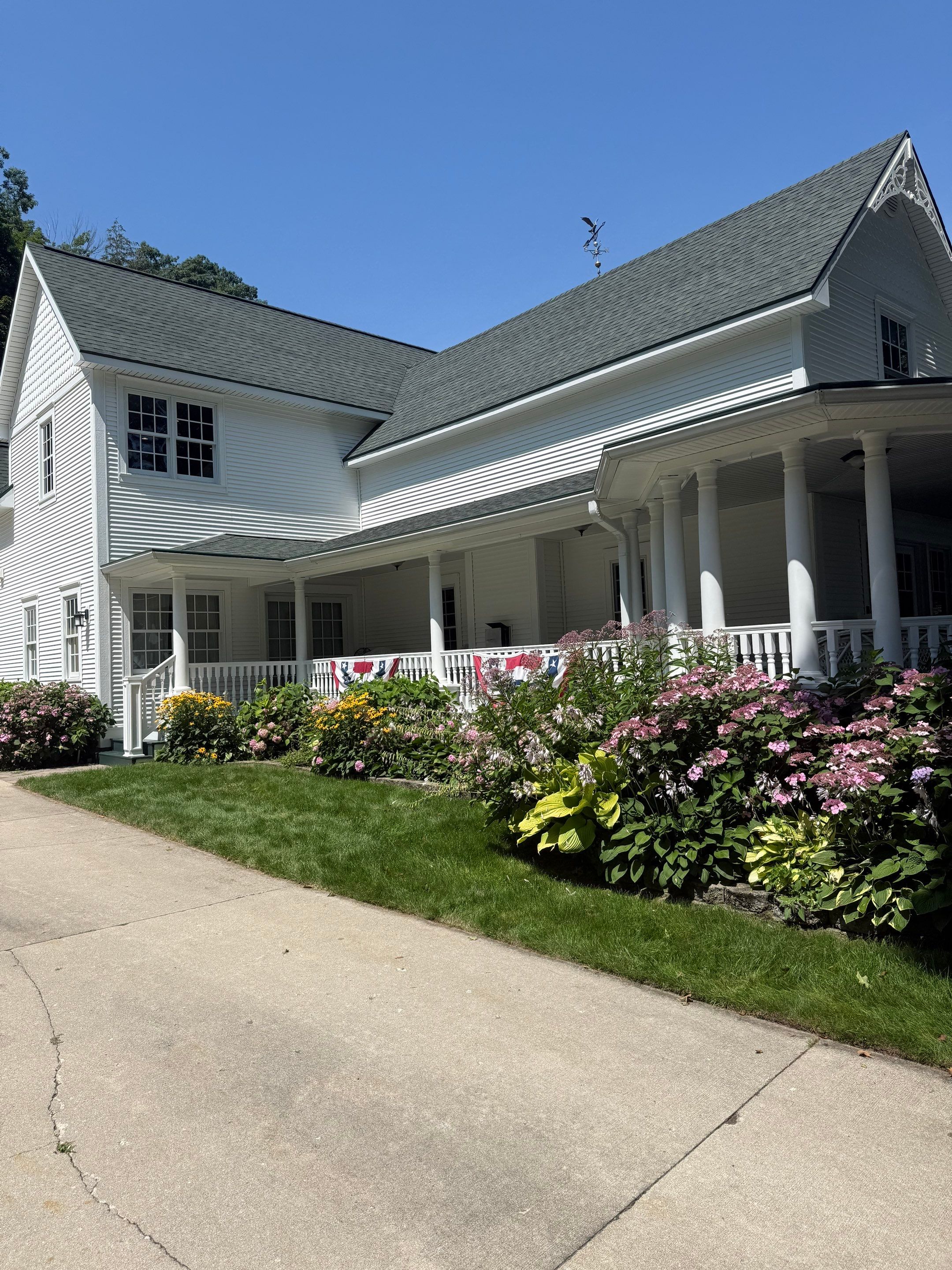 Gutter Helmet Installation for a Traverse City Residential Property by Rainbow Seamless Systems