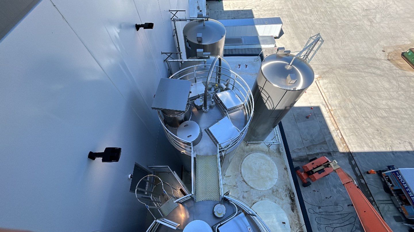Oil removal using hot water and environmentally friendly degreaser by Northern Power Washing LLC.