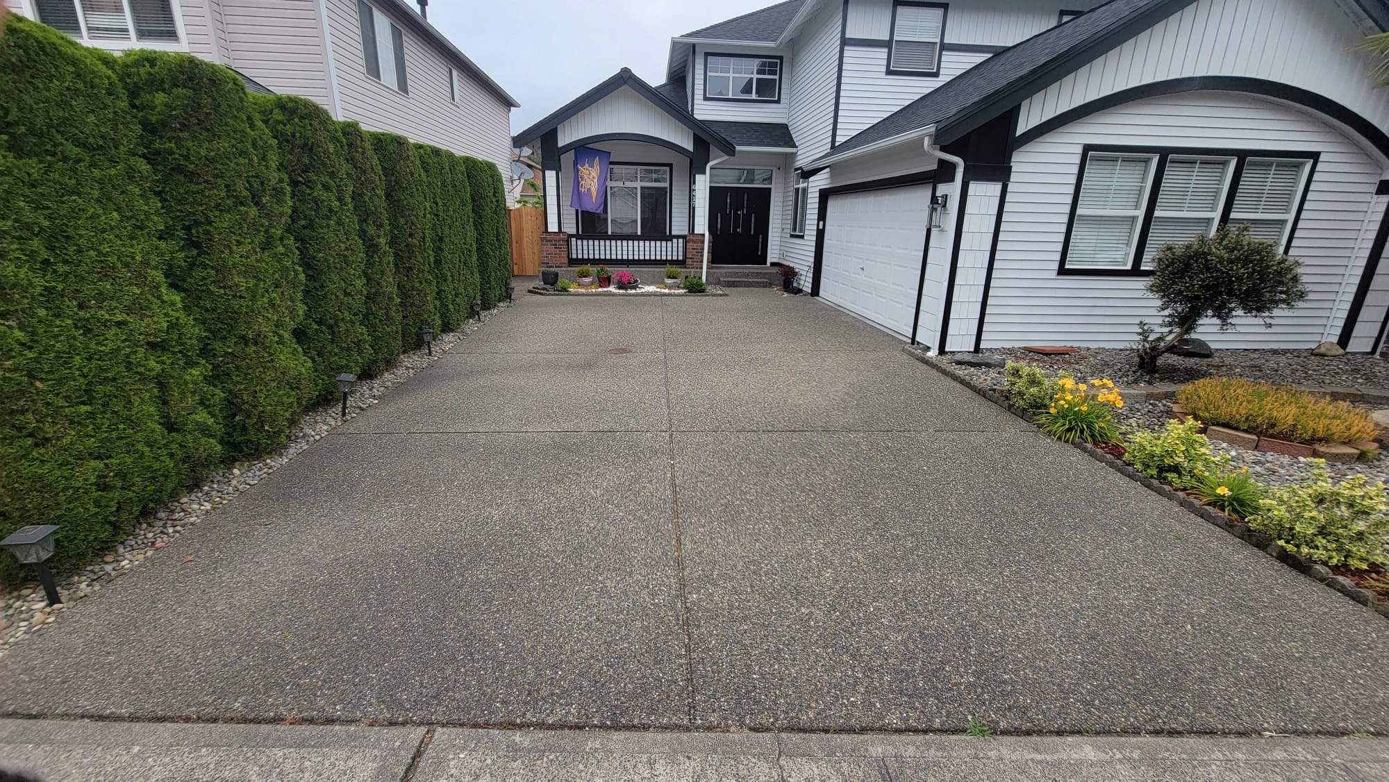 Poseidon Patio and Driveway by Concrete Coating Experts Inc.