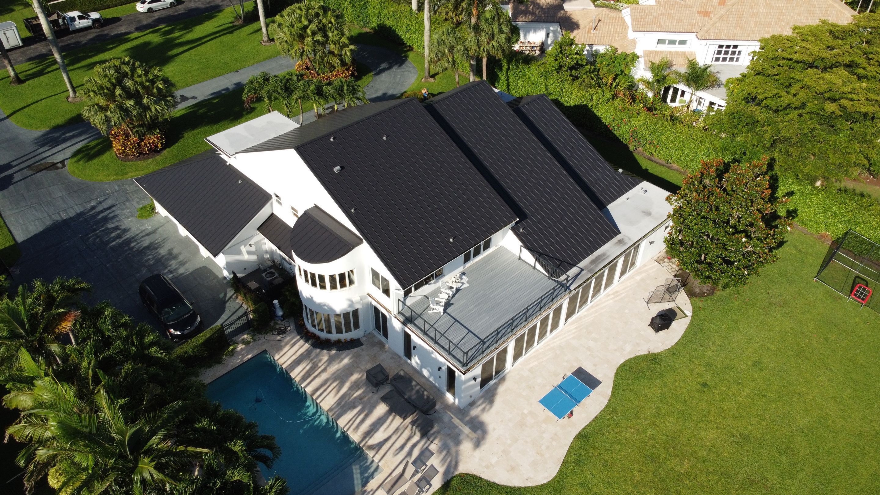 Residential Roofing Installation using 1" Nail strip metal roof by BLUES BROTHERS CONSTRUCTION CORP